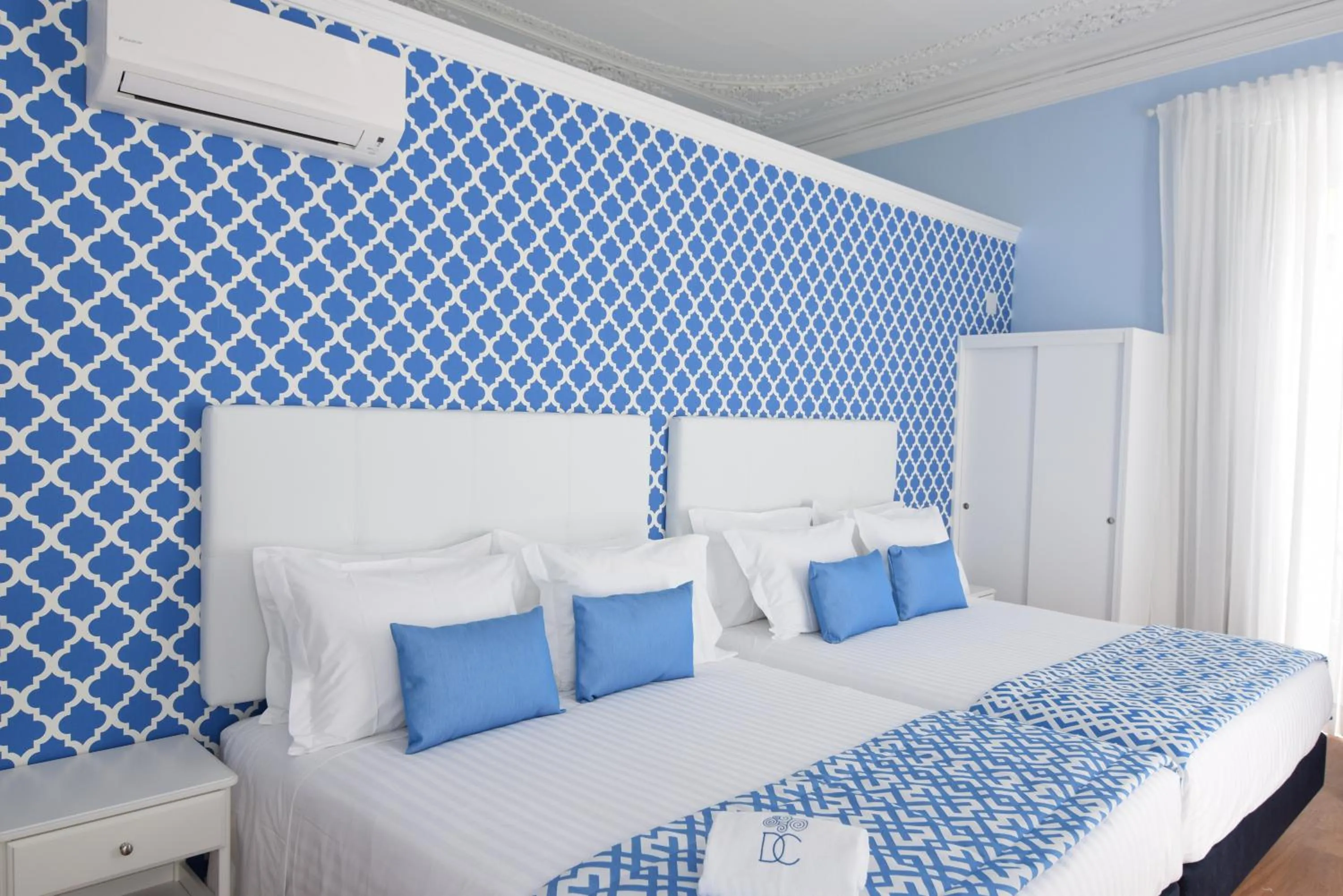 Decorative detail, Bed in Dream Chiado Apartments