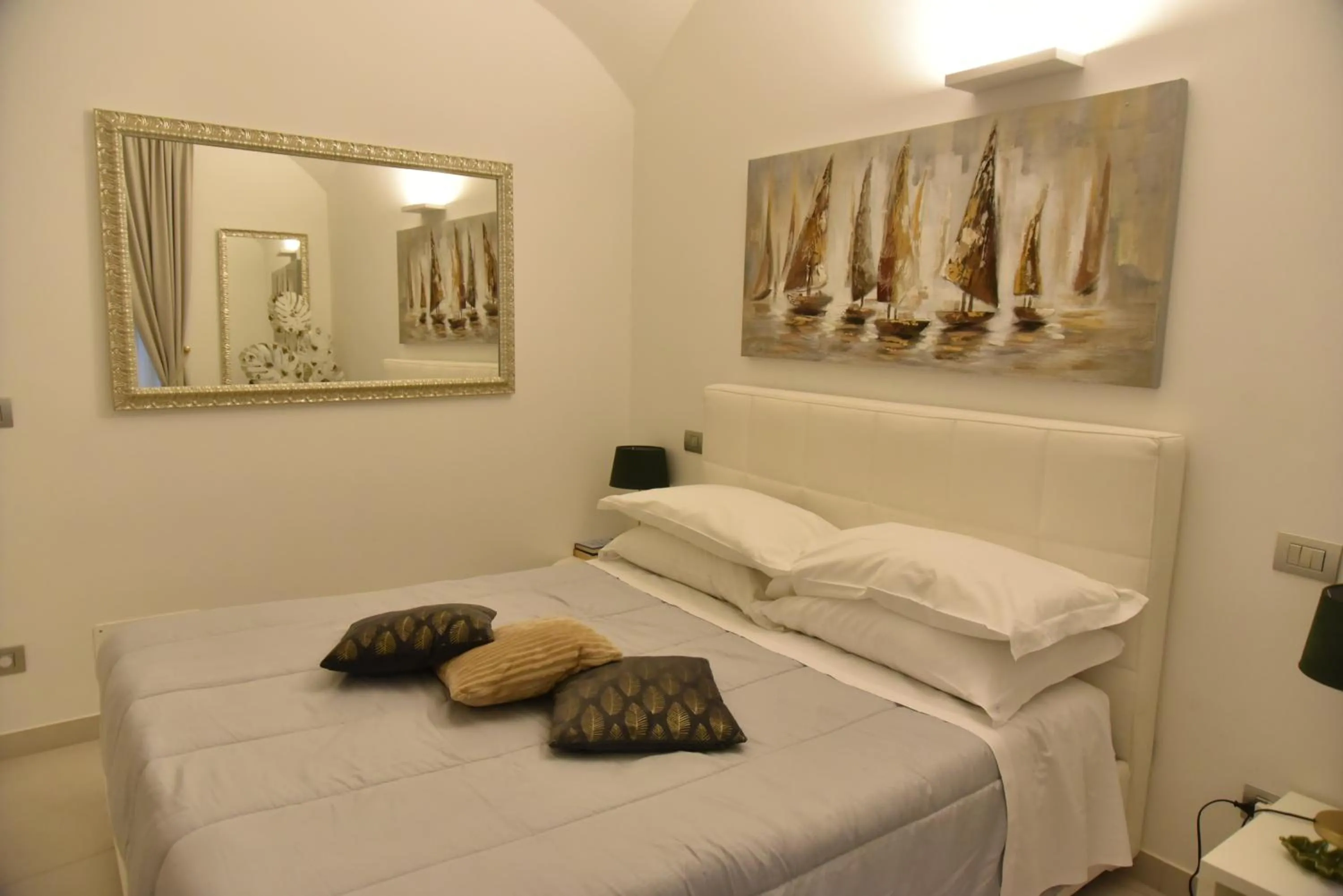 Bed in Conte Max Rooms