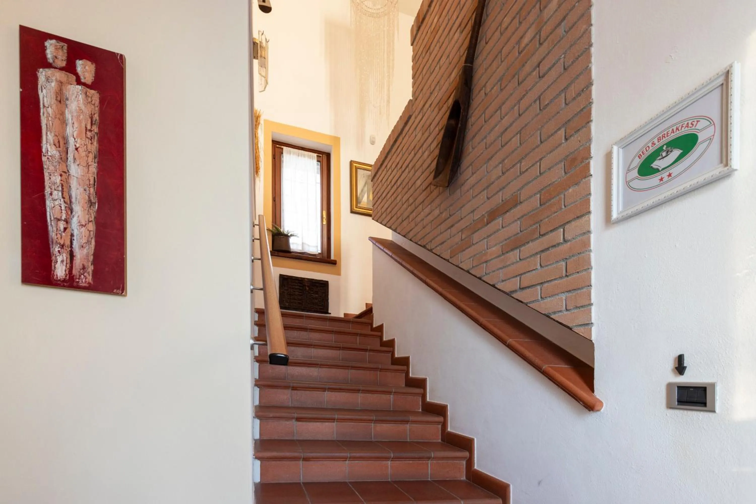 Communal lounge/ TV room in B&B Cascina Baraggione