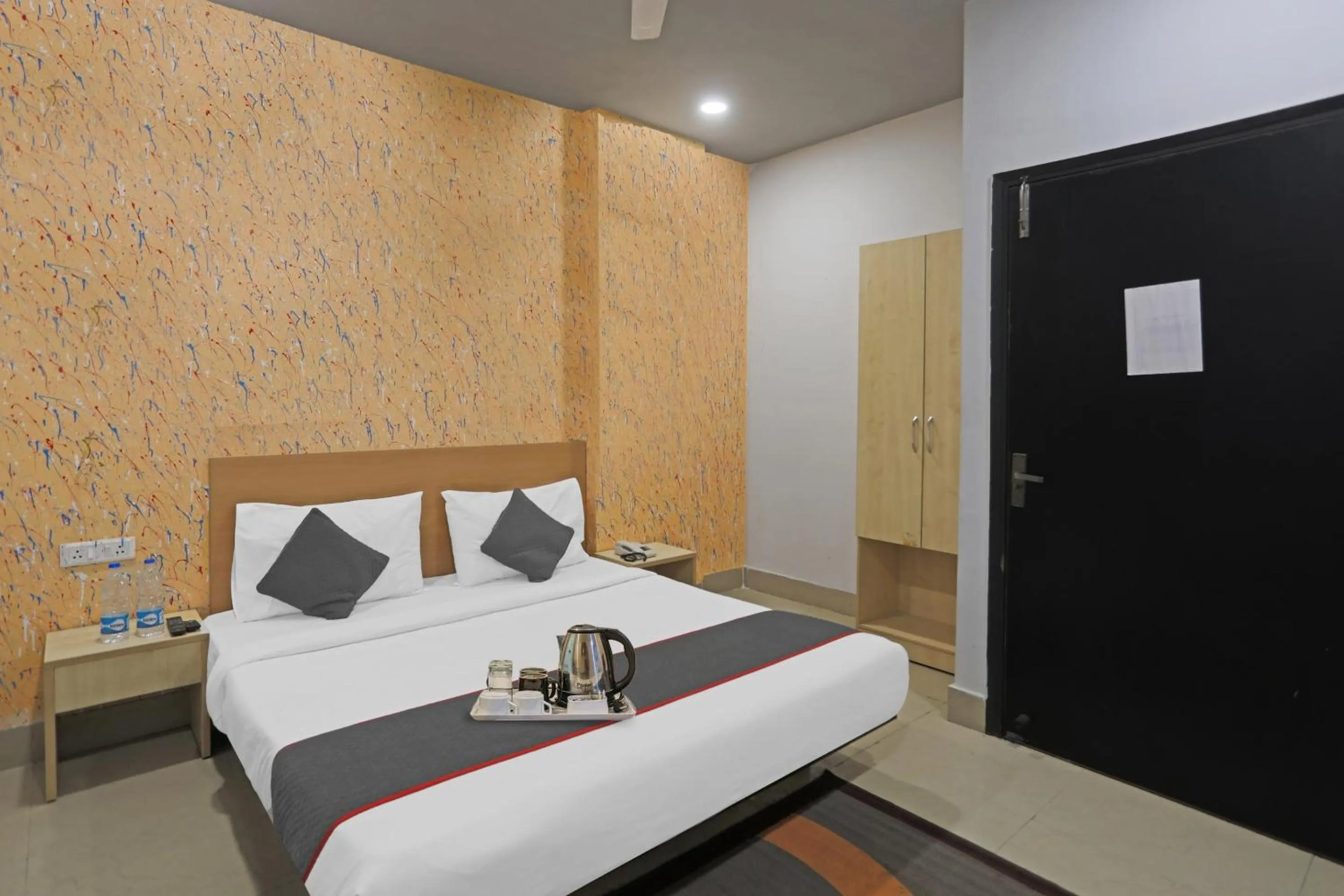 Bed in Super Townhouse Grand Pacific Ocean