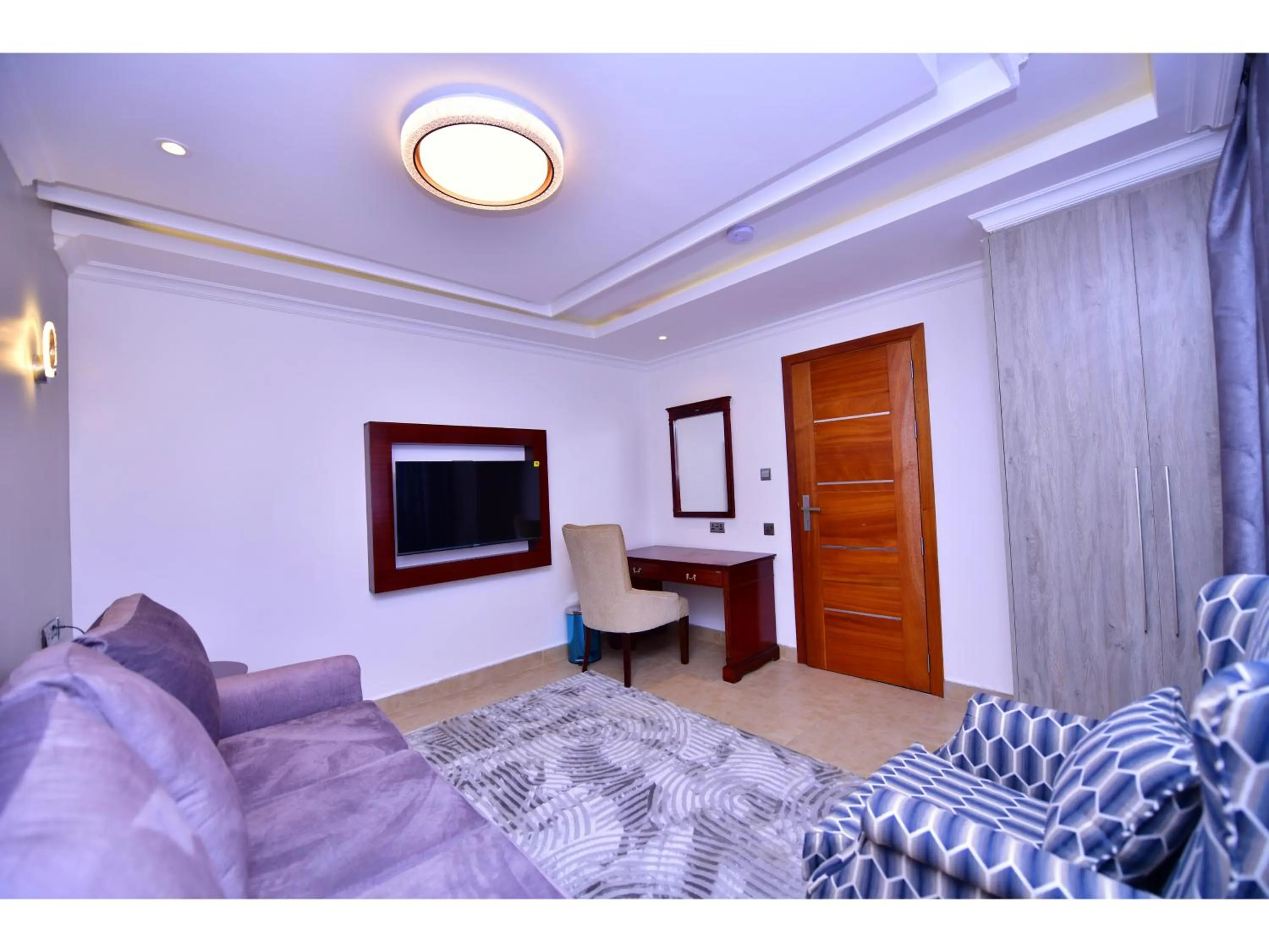 Living room, Bed in Olive Gardens Hotel Nairobi