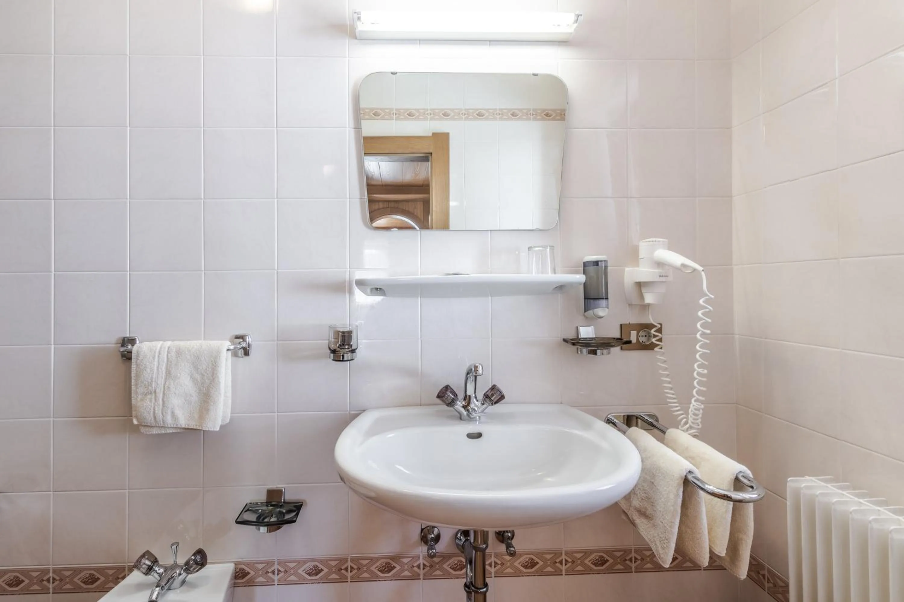 Bathroom in Garni Baita