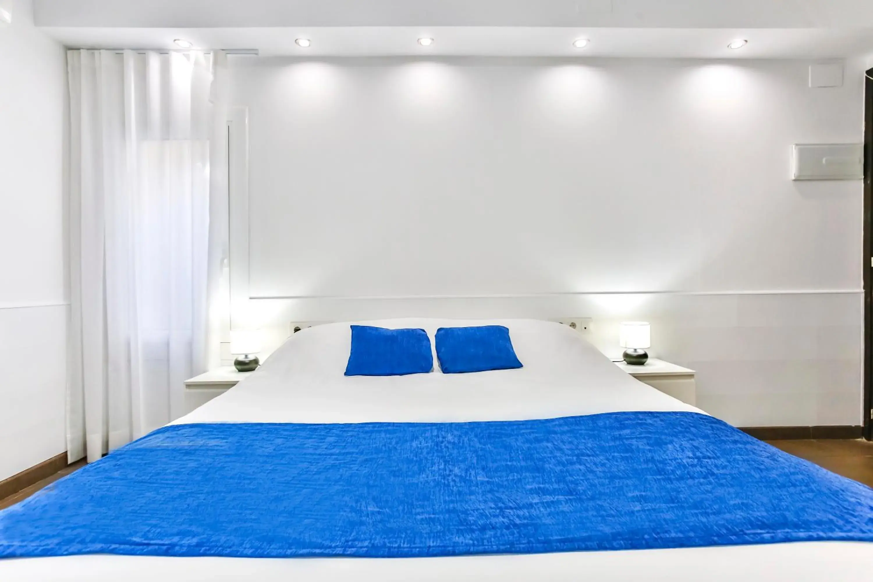 Bed in Laramond Barcelona Rooms Bed in Laramond Barcelona Rooms