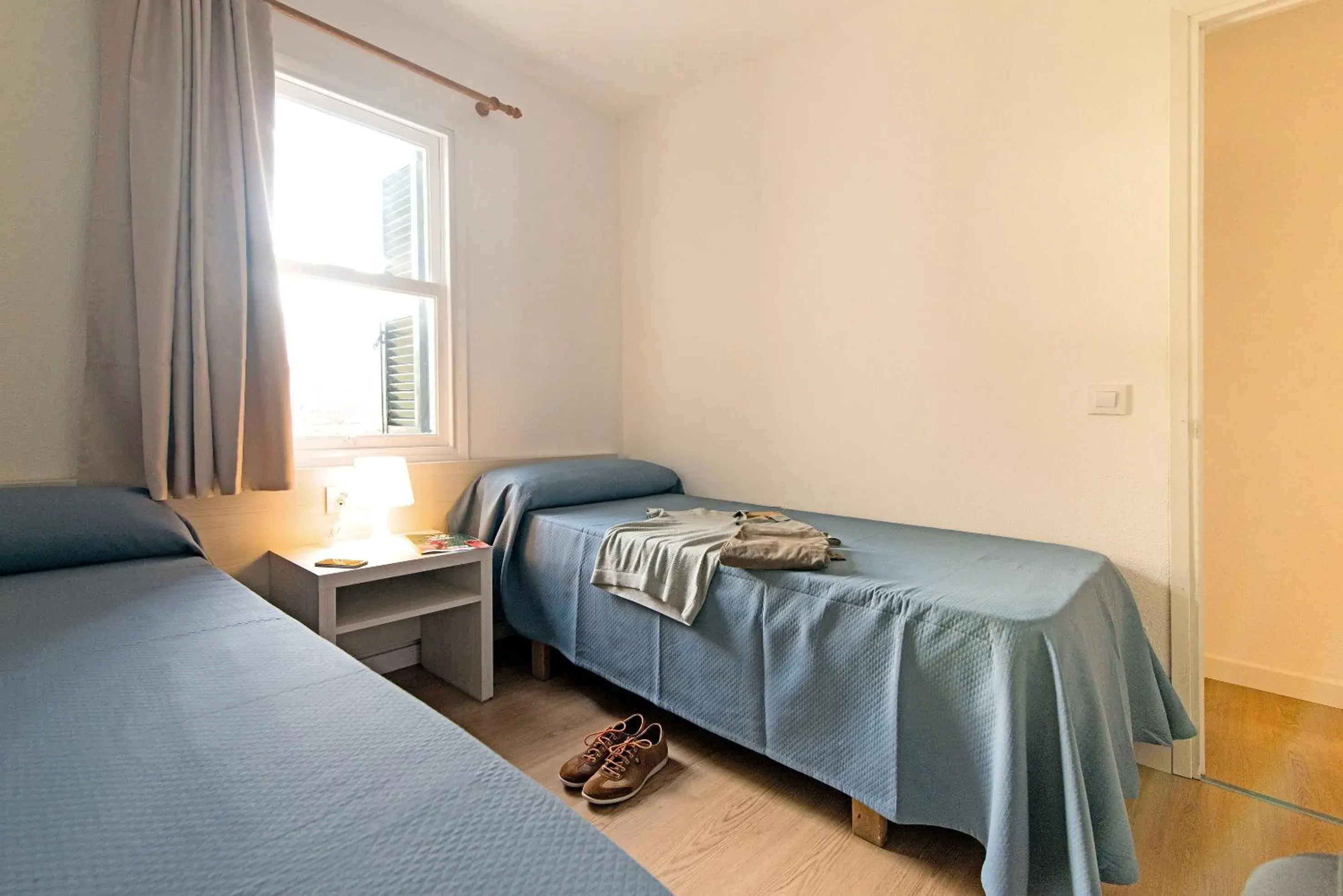 Bedroom, Bed in Apartamentos Cala Blanca Bedroom, Bed in Apartamentos Cala Blanca