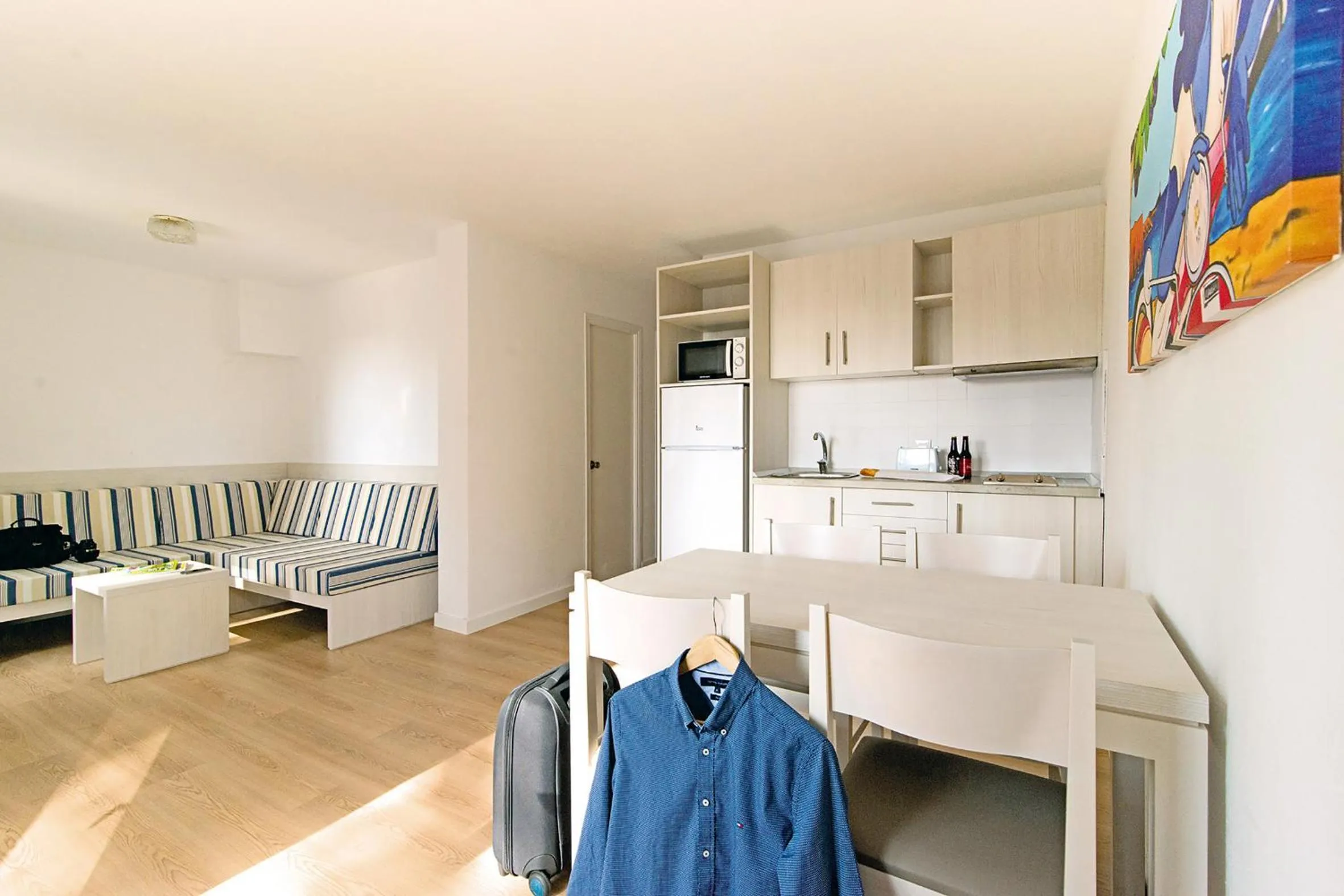 Living room, Bed in Apartamentos Cala Blanca