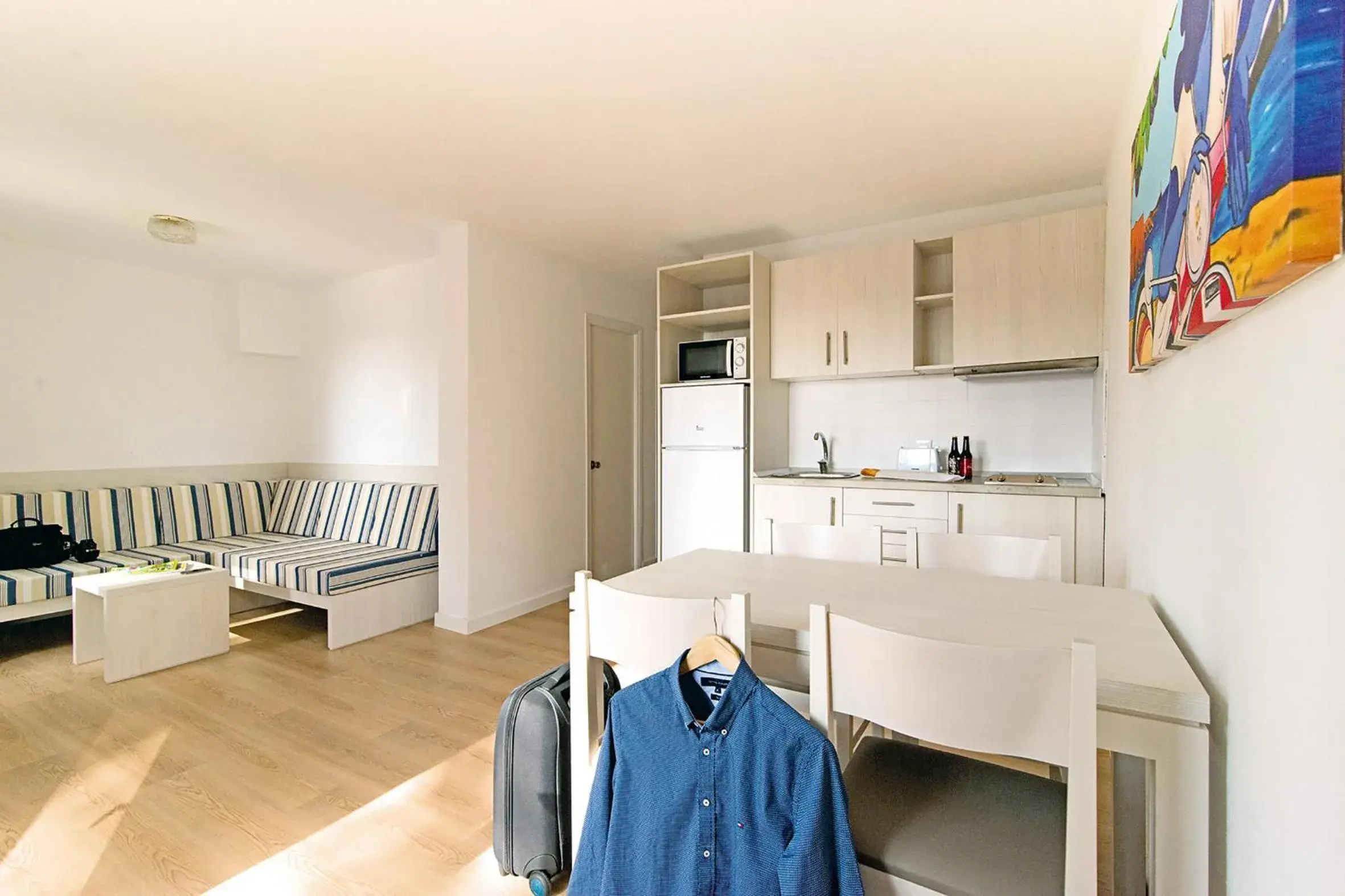 Living room, Bed in Apartamentos Cala Blanca Living room, Bed in Apartamentos Cala Blanca