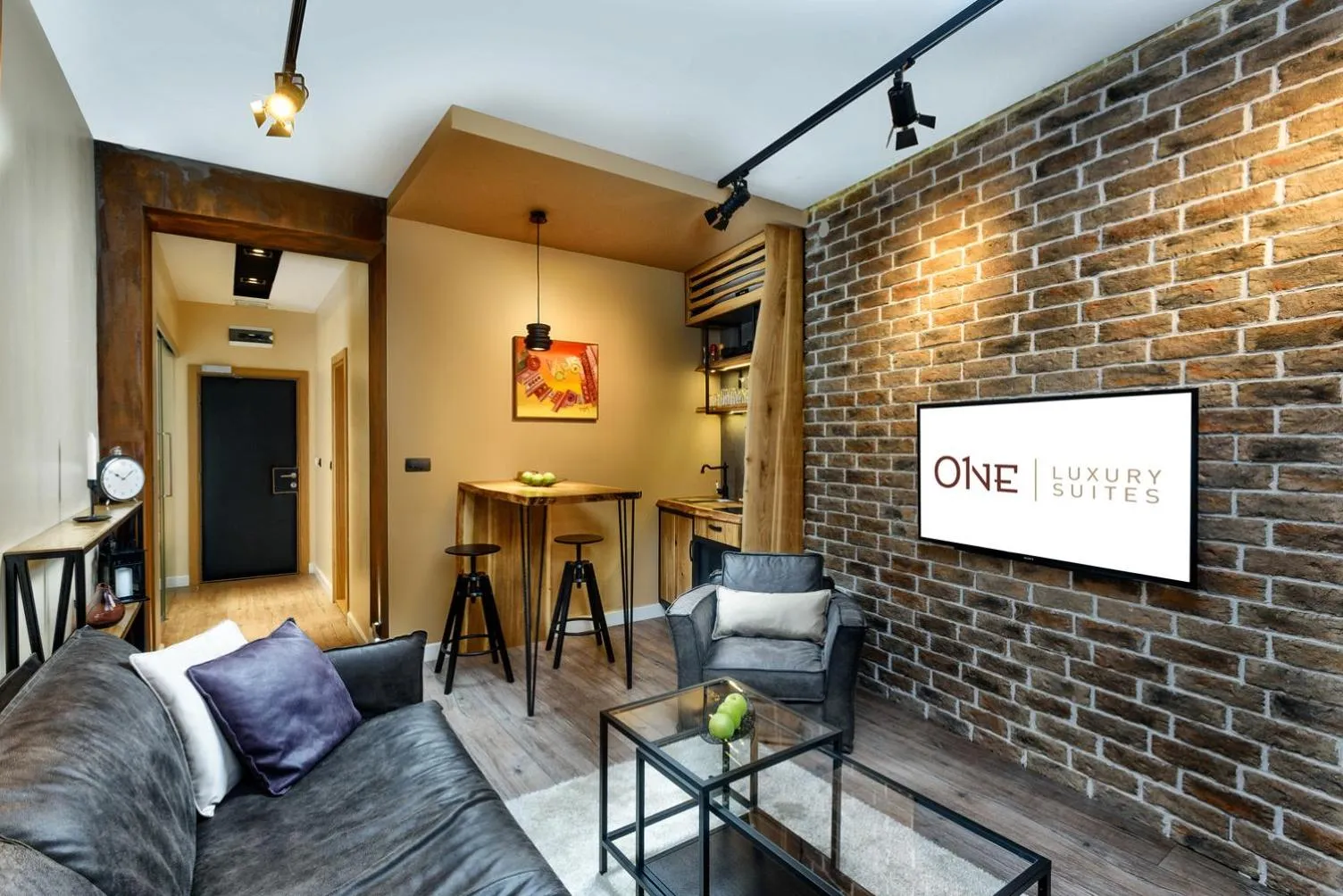 Property logo or sign in One Luxury Suites