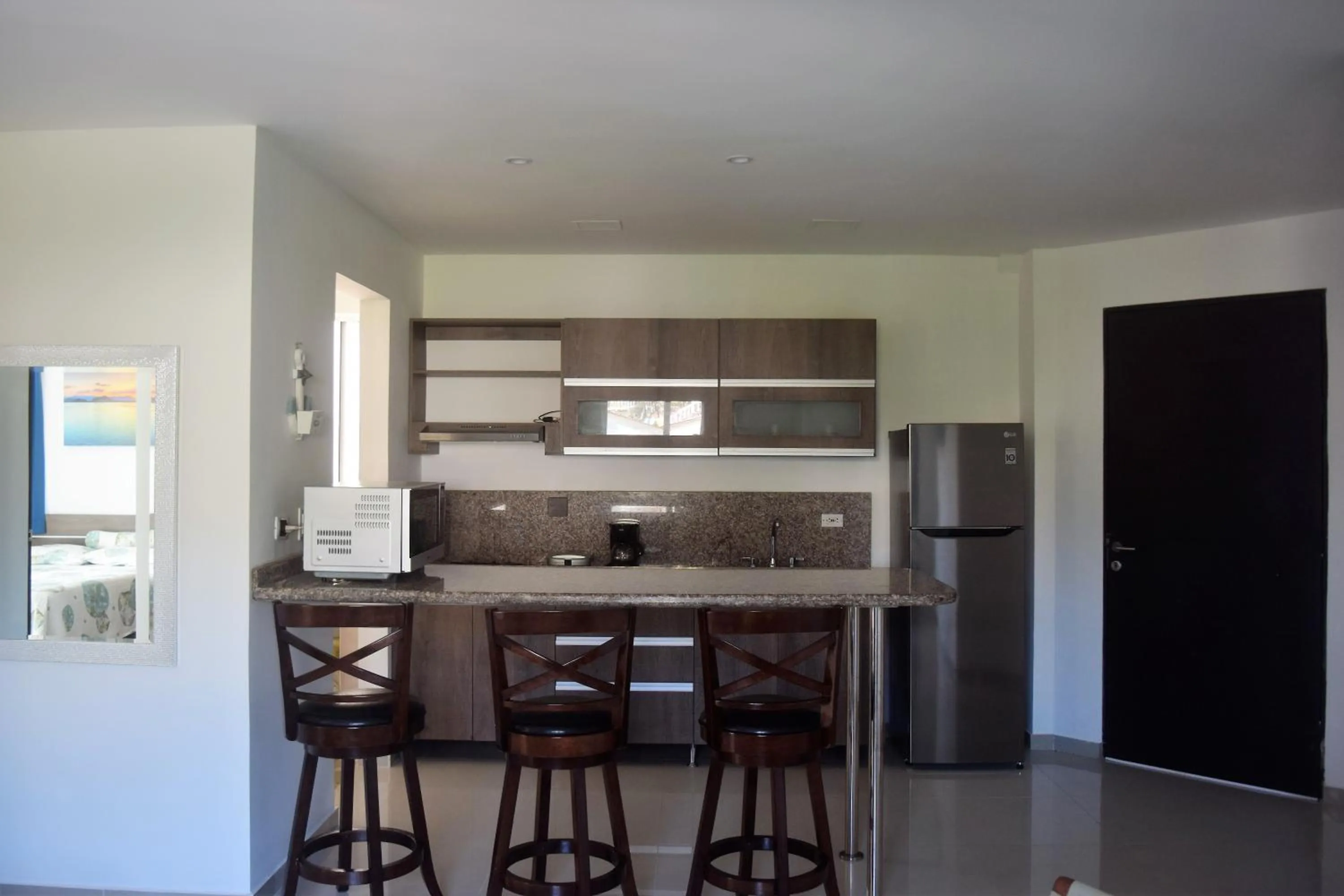 Kitchen or kitchenette in Sea Colors Apartments