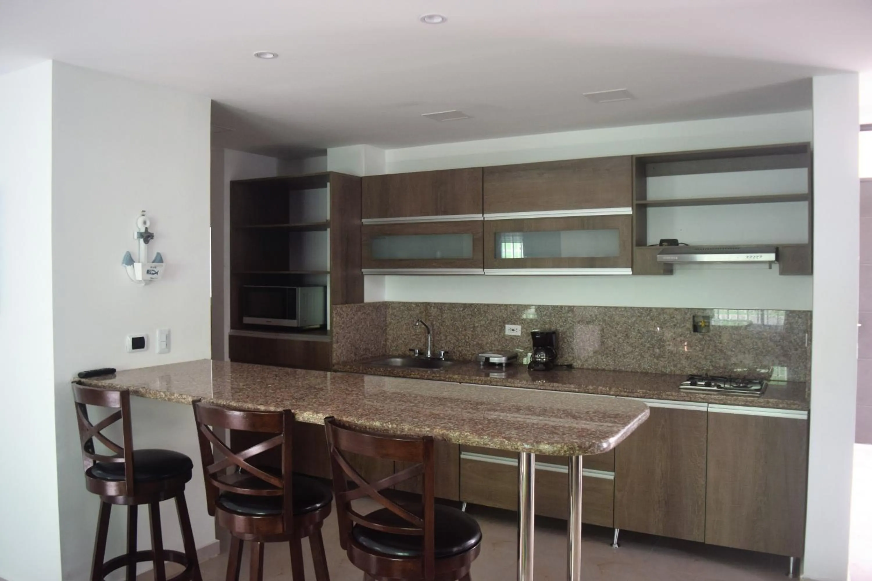 Kitchen or kitchenette in Sea Colors Apartments