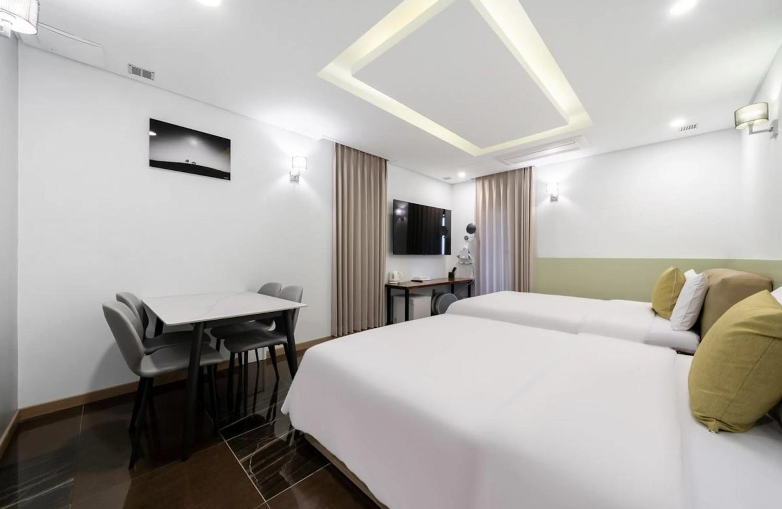 Bed in Daejeon Yuseong MAC Hotel
