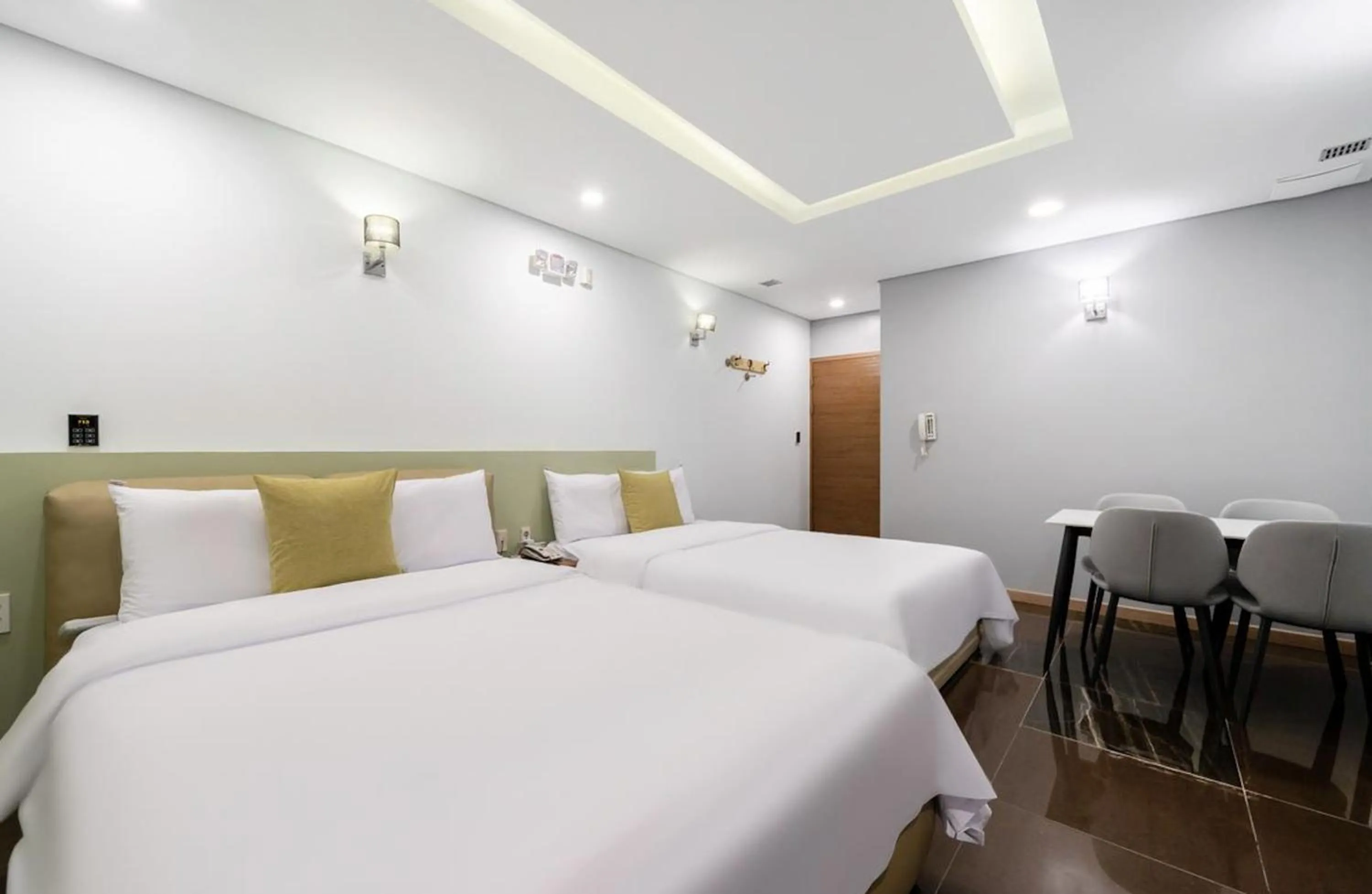 Bed in Daejeon Yuseong MAC Hotel
