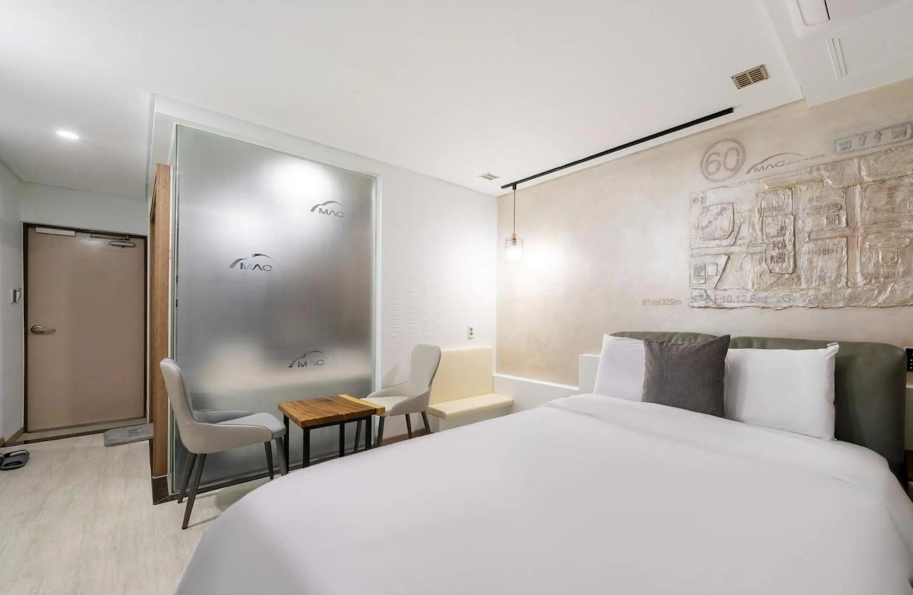 Bed in Daejeon Yuseong MAC Hotel