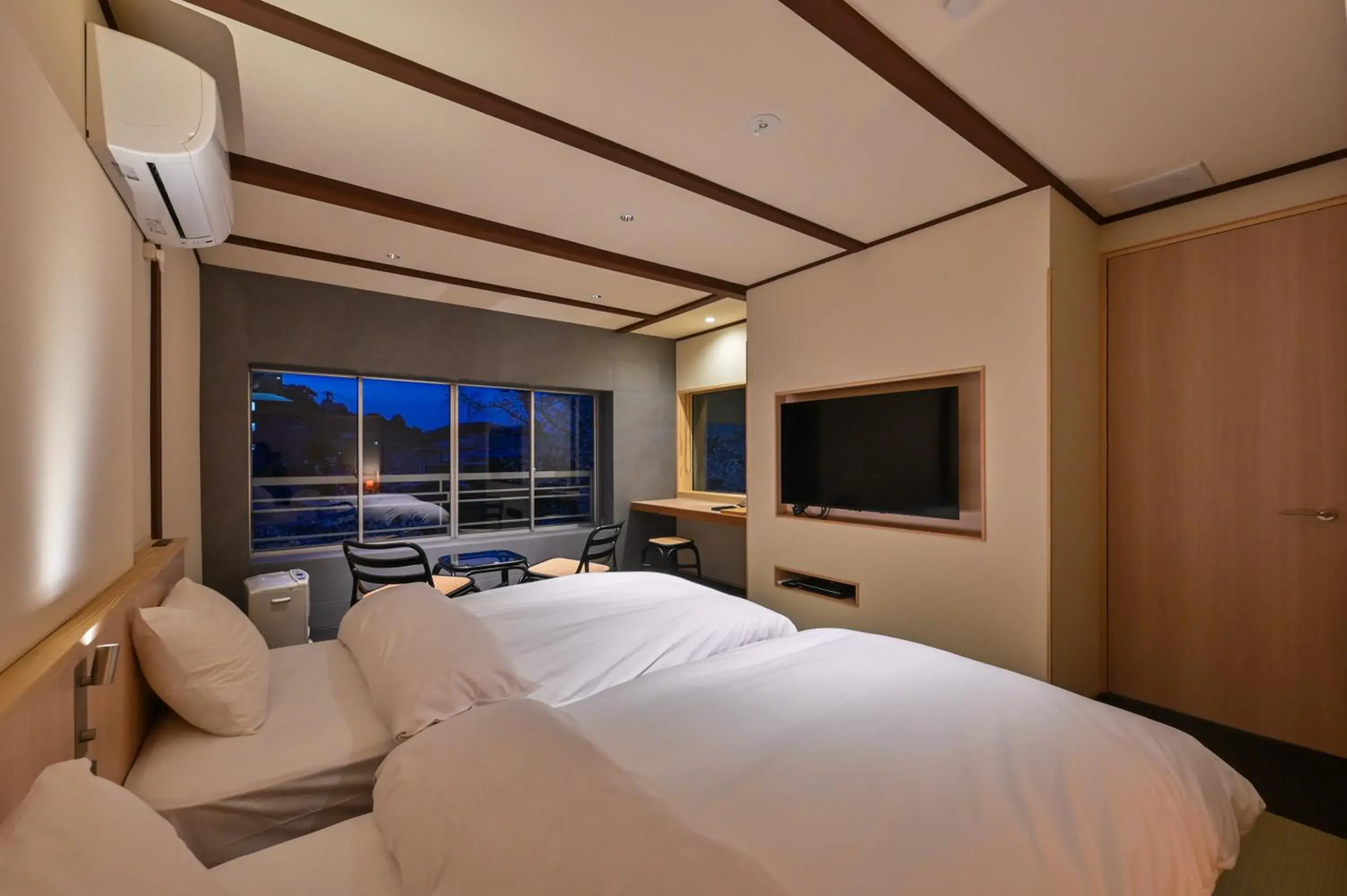 Bed in Ryokan Yoshidaya Bed in Ryokan Yoshidaya