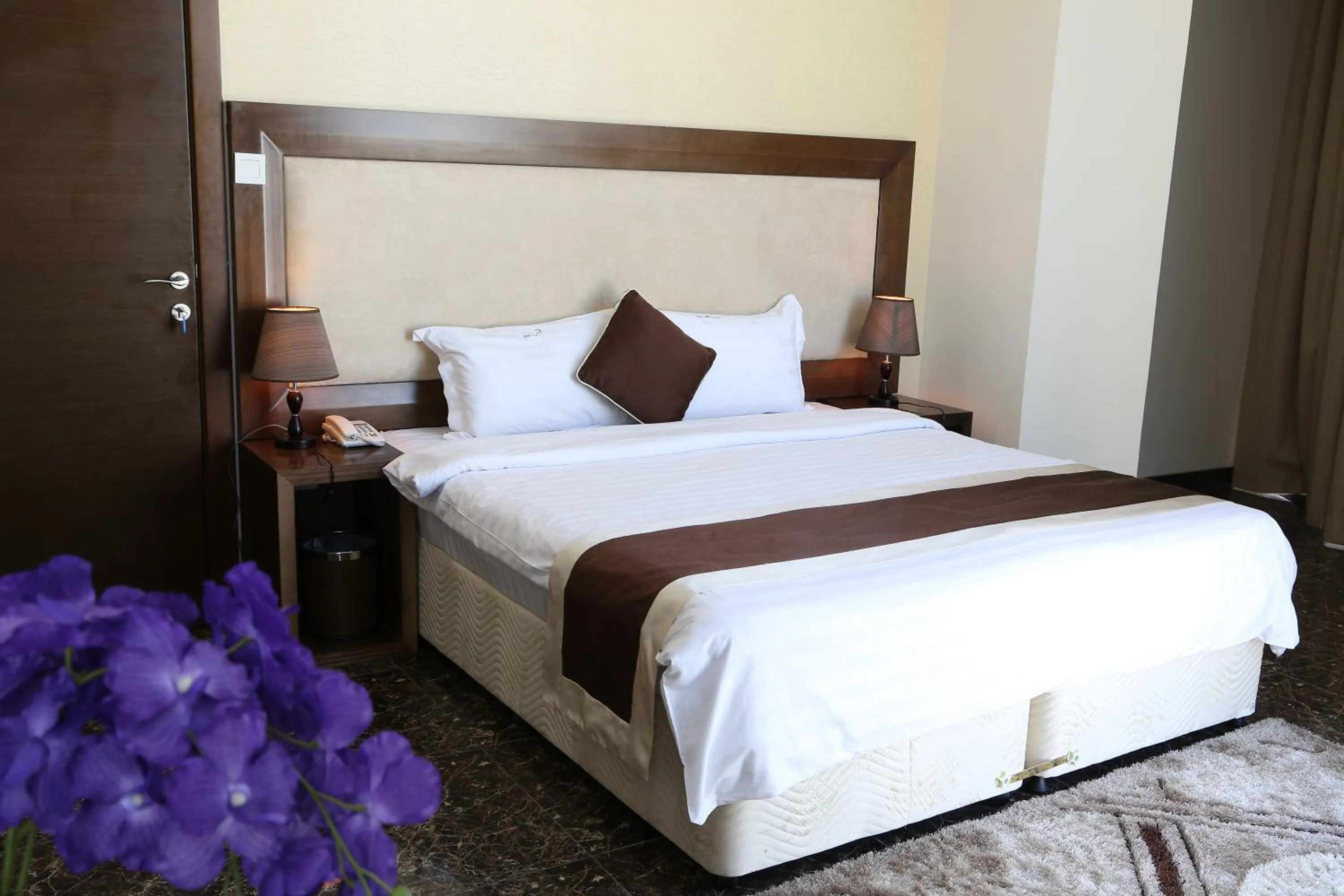 Photo of the whole room, Bed in Belle Tower Apartments