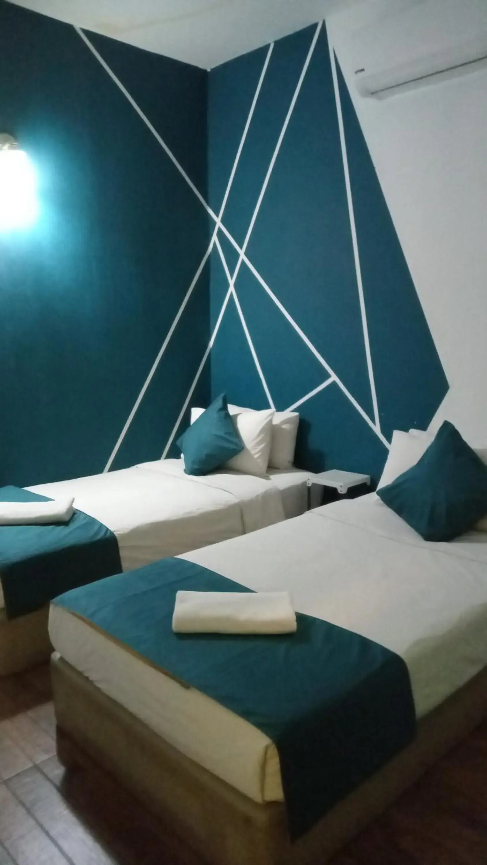 Bed in Olive Hotel Bed in Olive Hotel