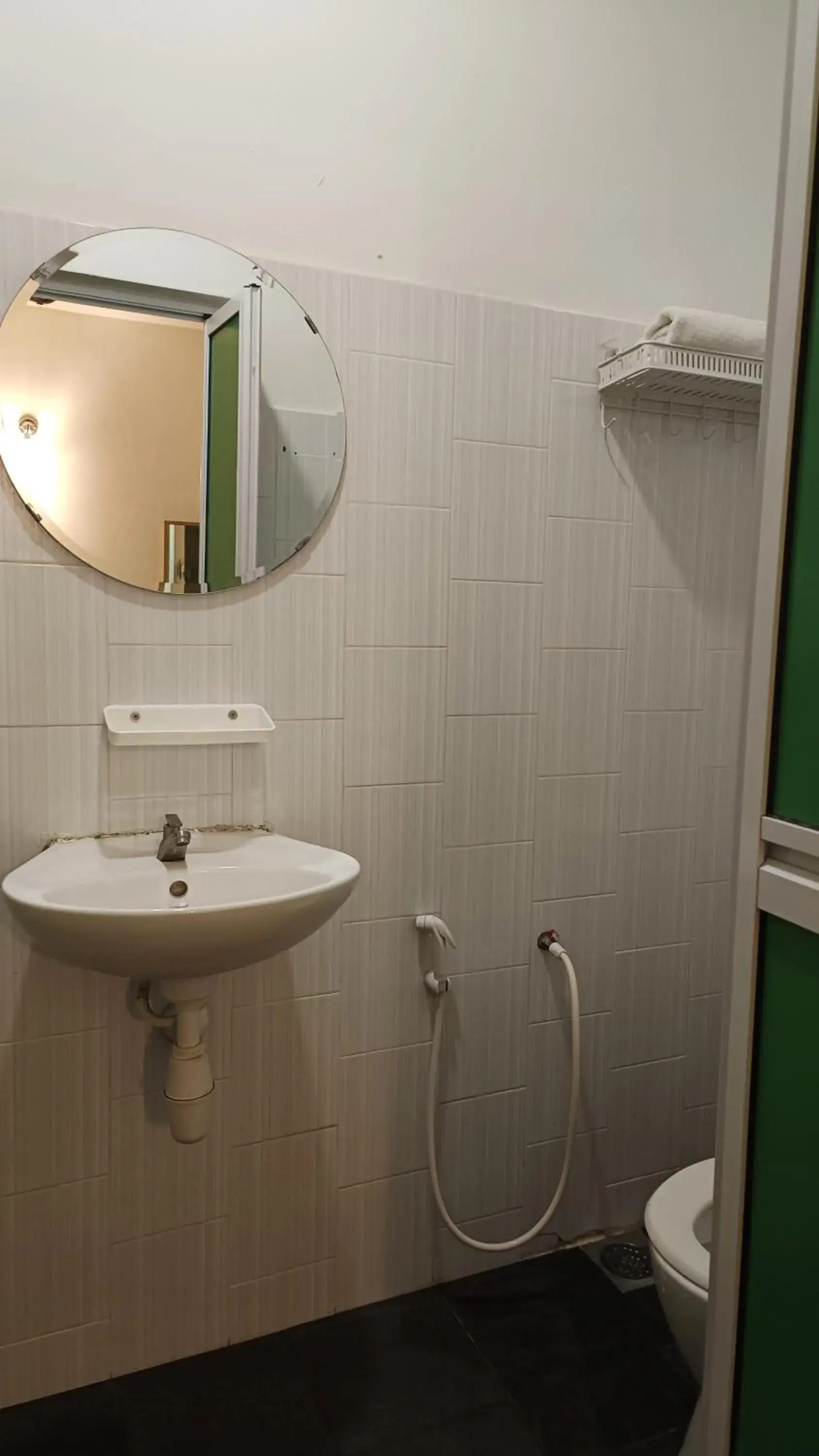 Toilet in Olive Hotel Toilet in Olive Hotel