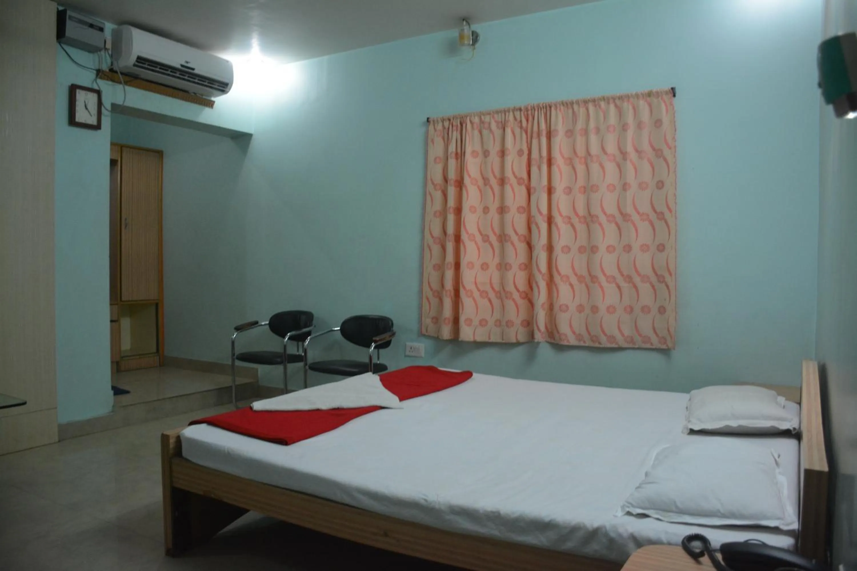 Bed in Hotel Naveen Residency
