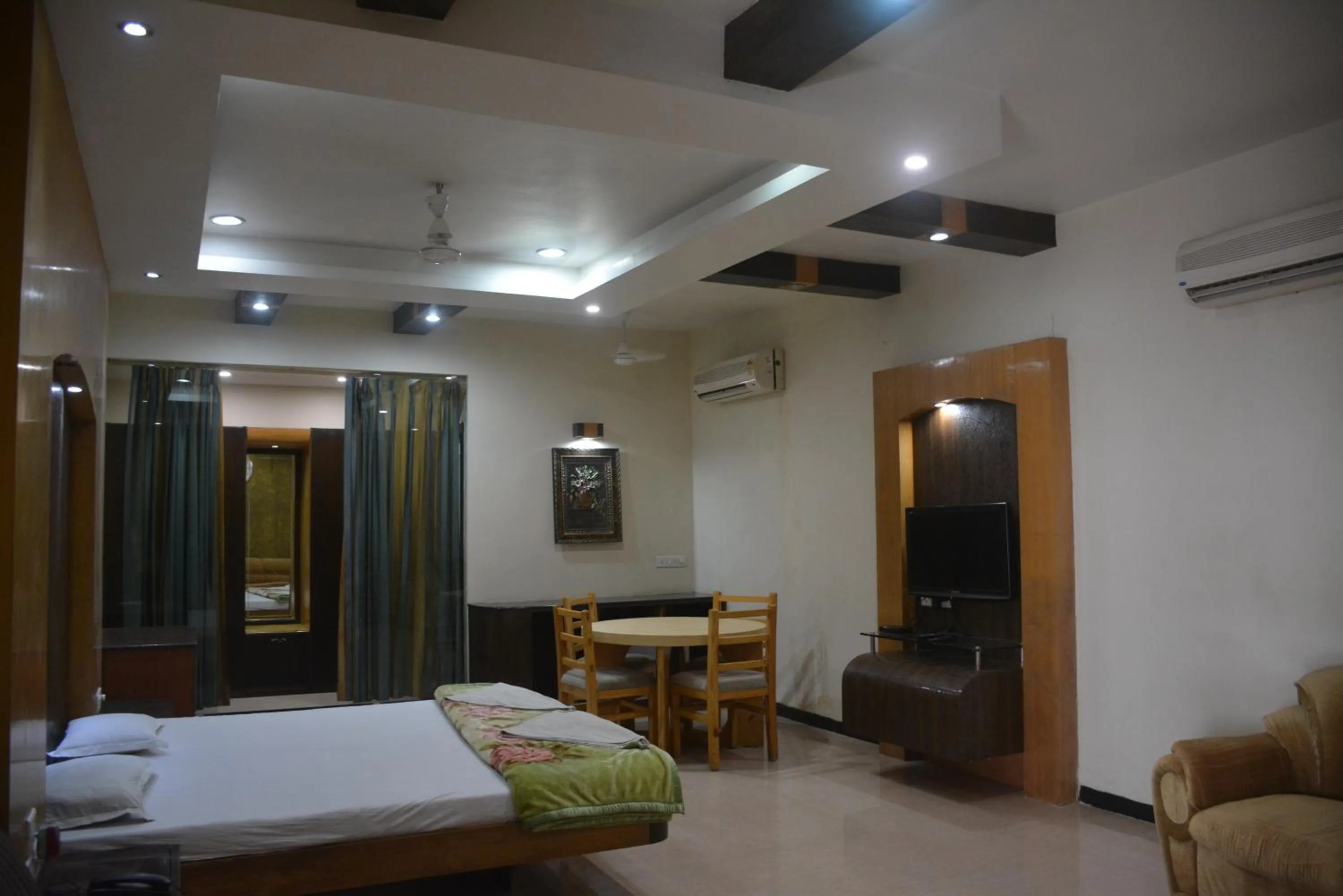 Bed in Hotel Naveen Residency