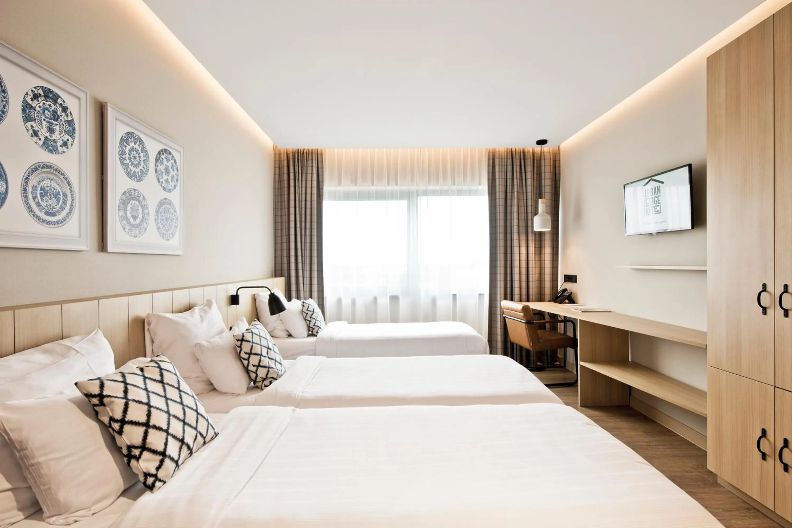 Photo of the whole room, Bed in Urban Lodge Hotel