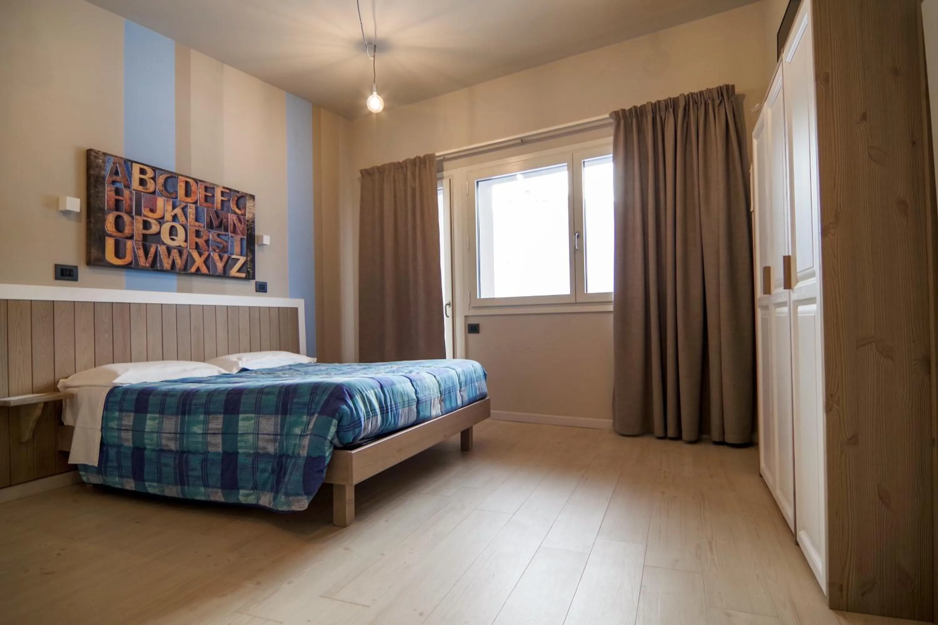 Bed in Hotel Laghetto