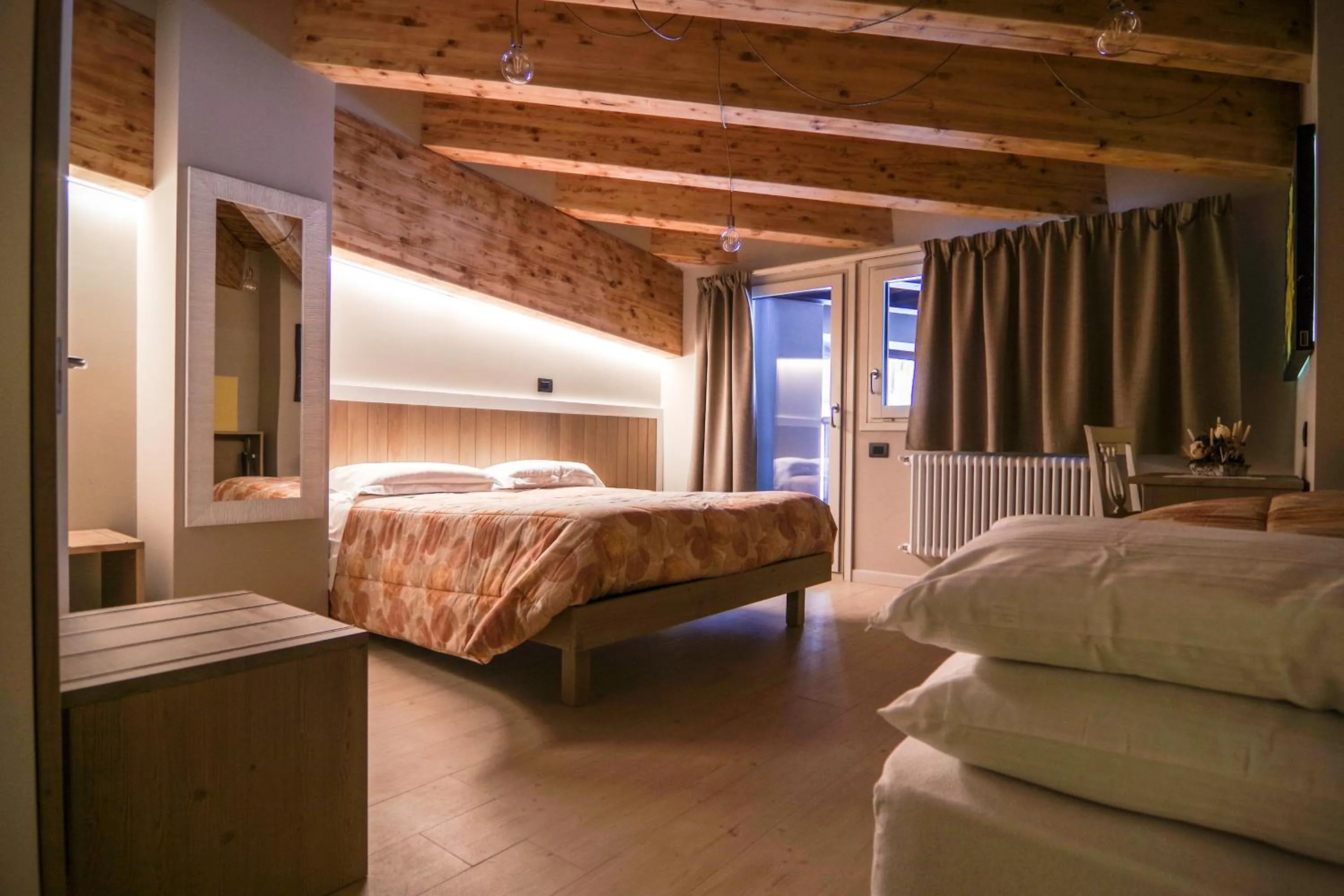 Bed in Hotel Laghetto