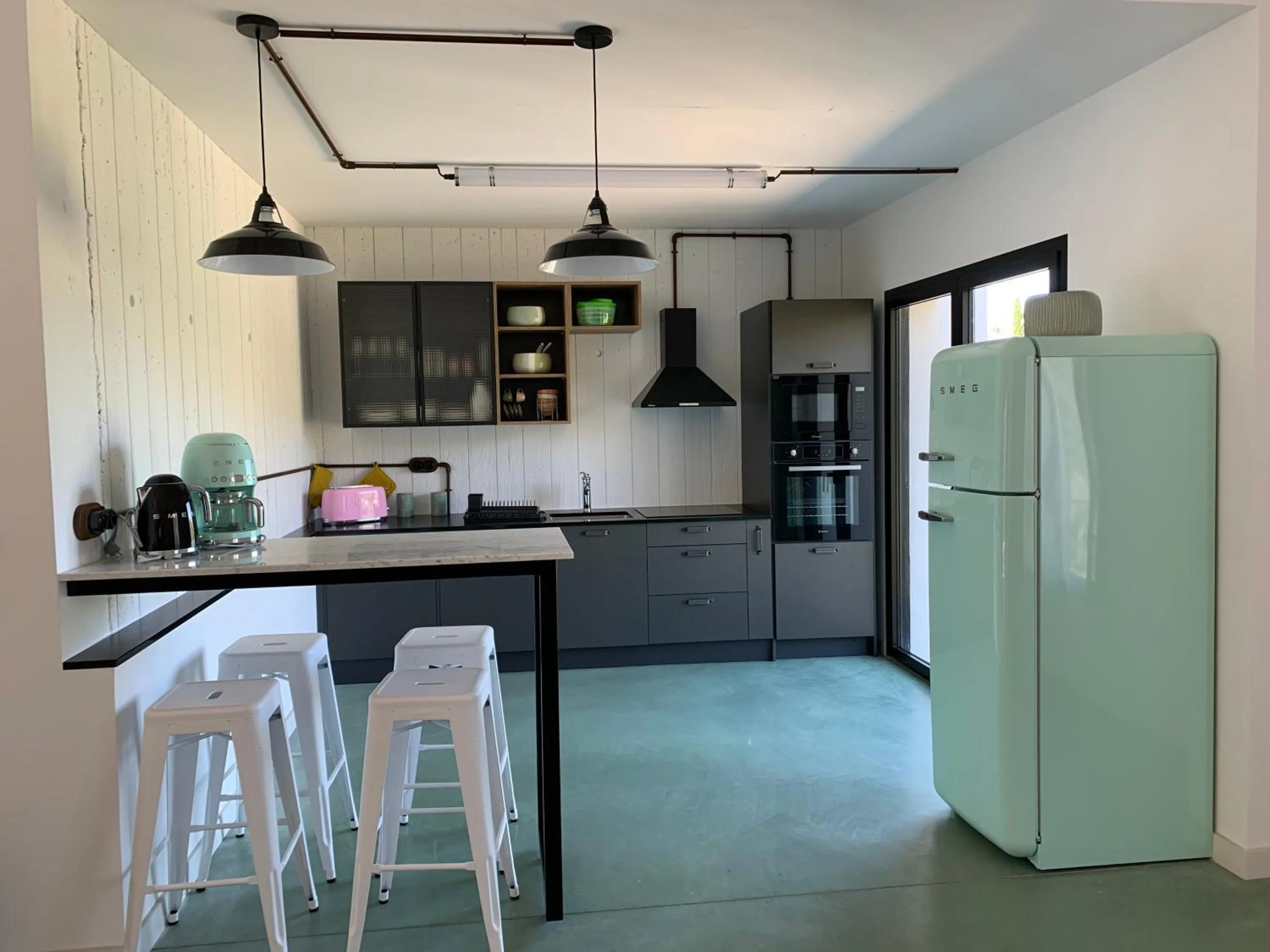 Kitchen or kitchenette in Appart'hotel Fior Di Ribba