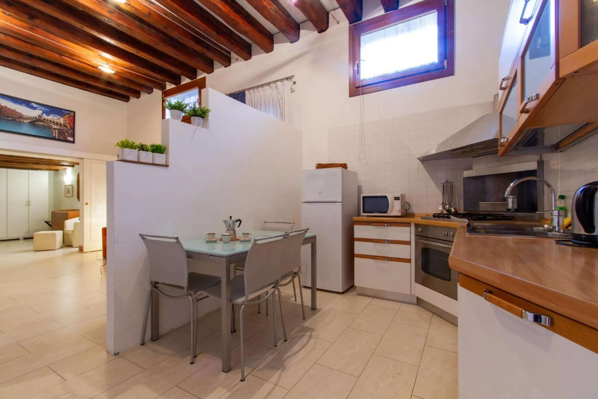Kitchen or kitchenette in Art Dreams Apartment Dimora Casanova