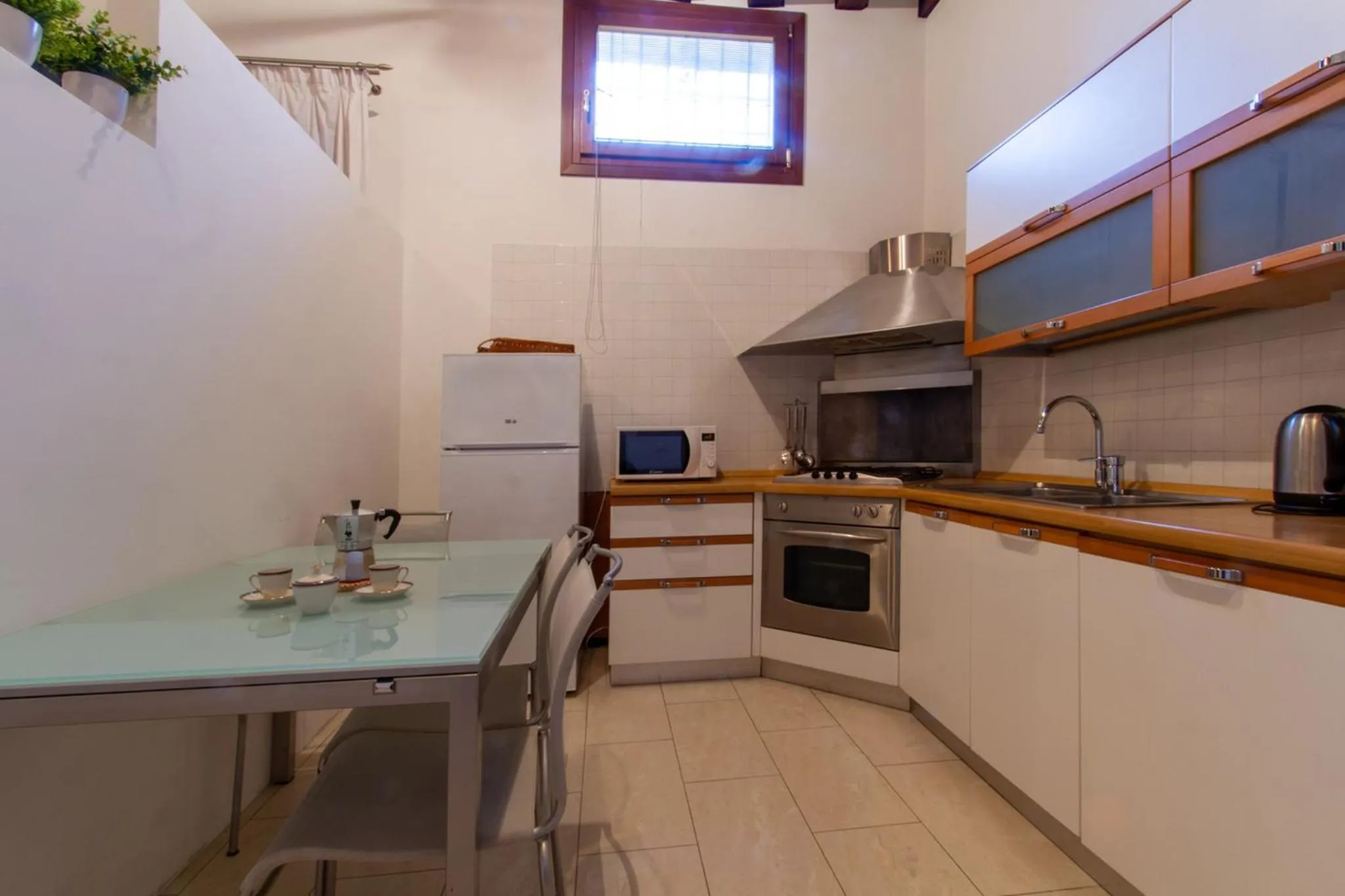 Kitchen or kitchenette in Art Dreams Apartment Dimora Casanova