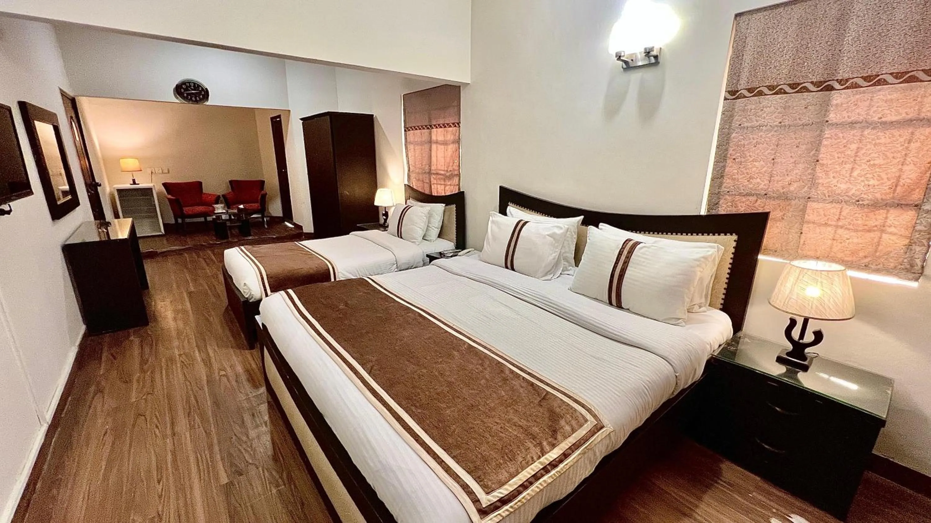 Bed in Royal Inn Hotel