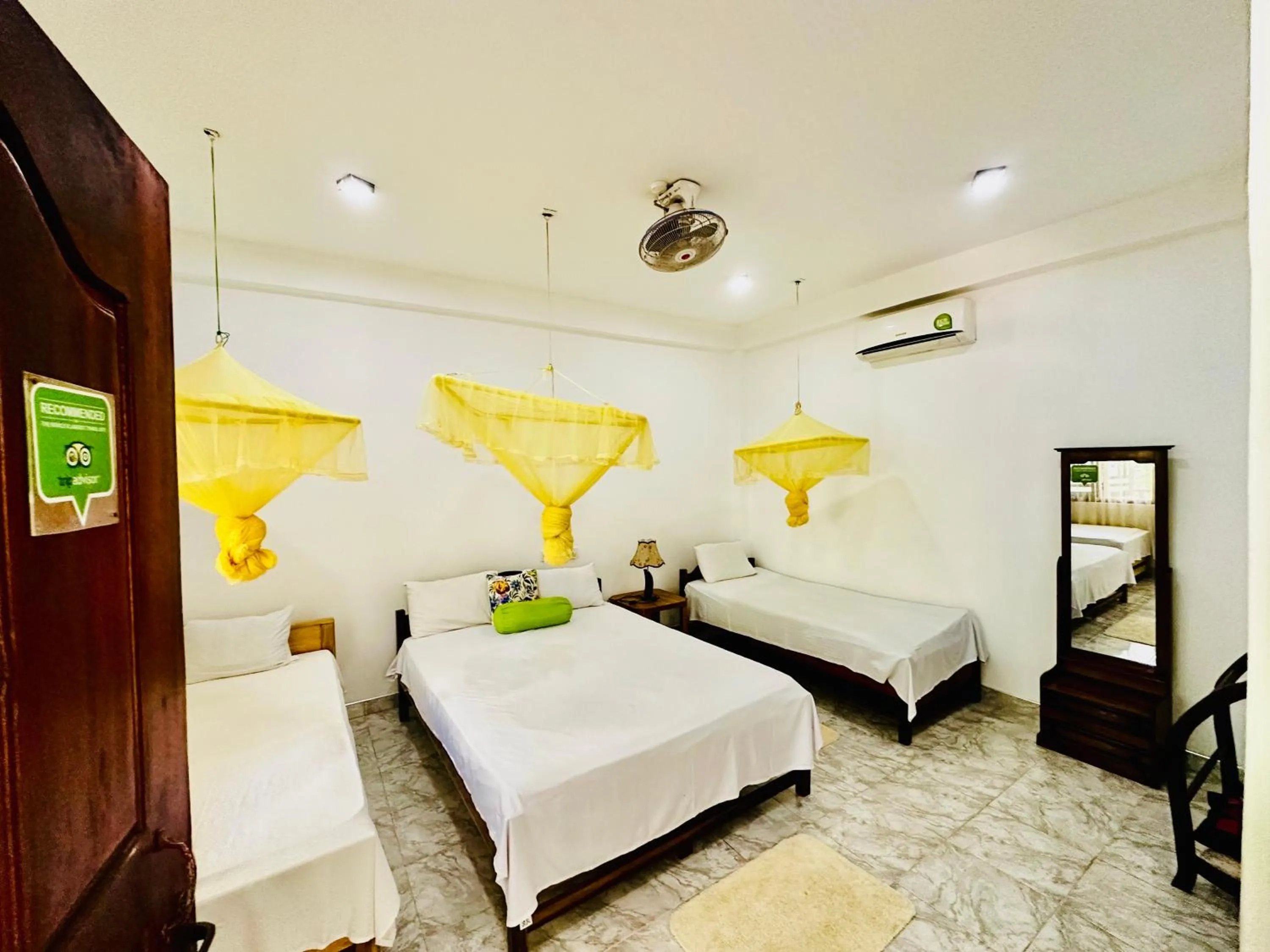 Bed in Sigiri Rainbow Lodge
