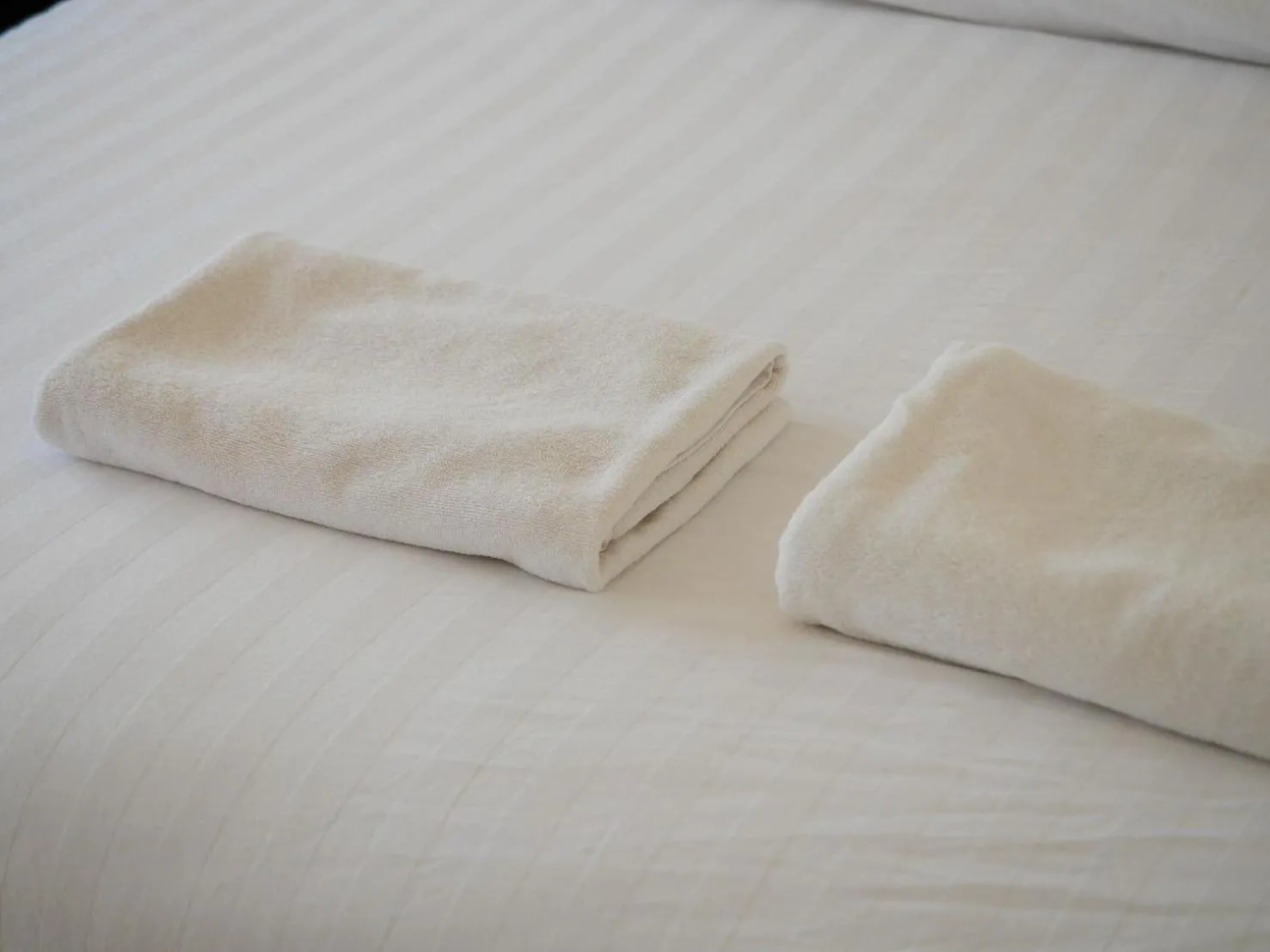 Bed in Riverside Houayxay Hotel