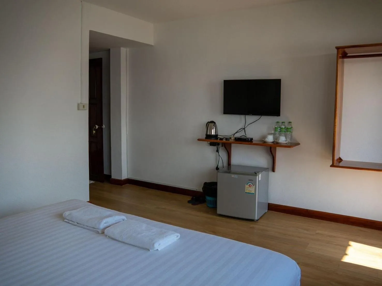 Bed in Riverside Houayxay Hotel