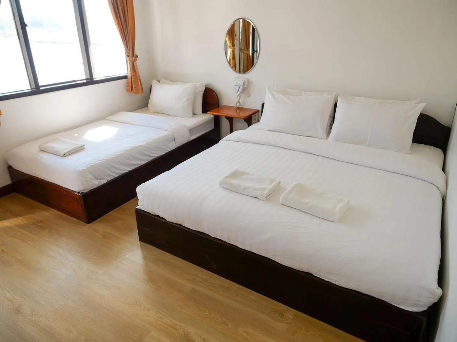 Bed in Riverside Houayxay Hotel