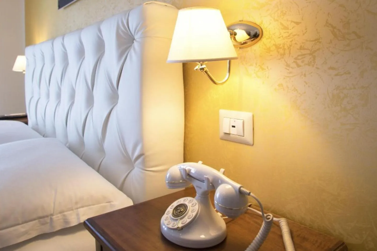 Bed in NeapolitanTrips Hotel