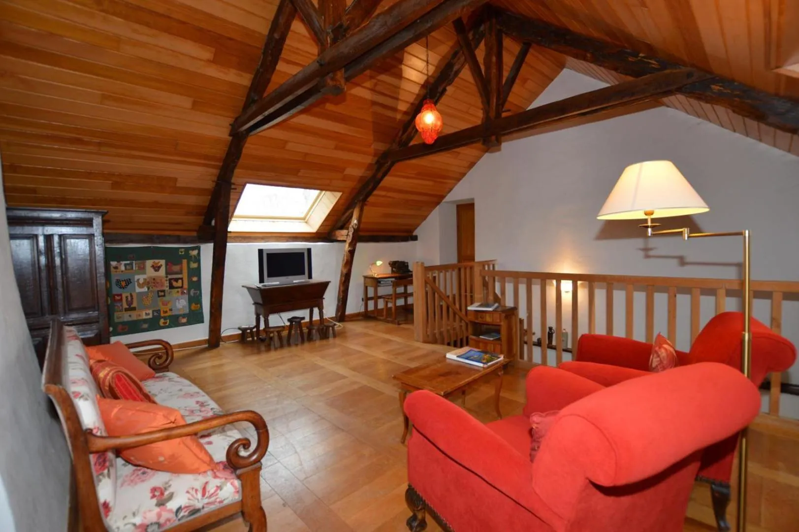 Communal lounge/ TV room in Maison d'hôtes de l'Huardière