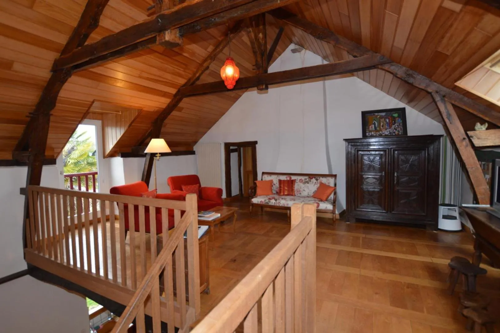 Communal lounge/ TV room in Maison d'hôtes de l'Huardière
