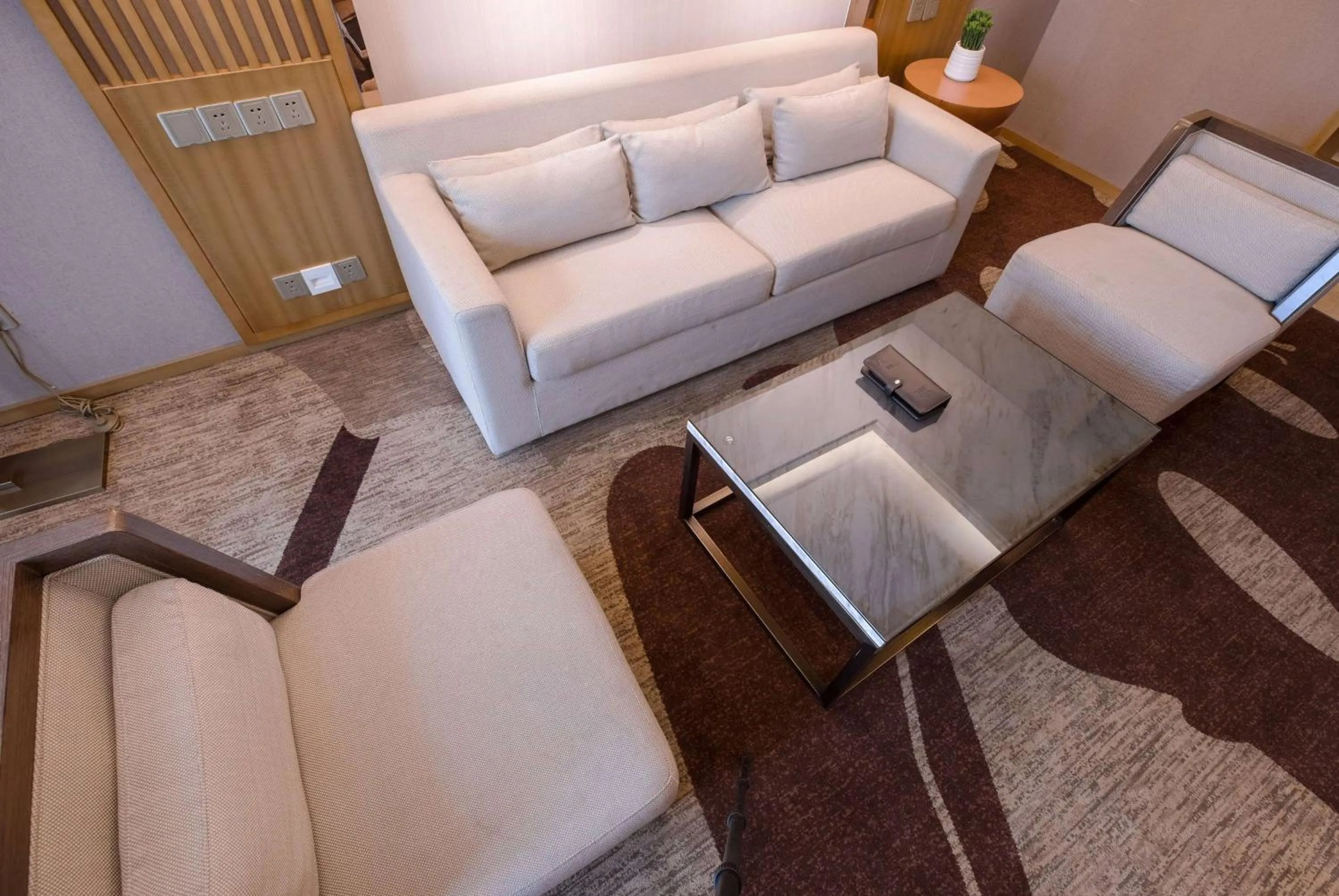 Living room in Ramada Plaza By Wyndham Fuzhou South