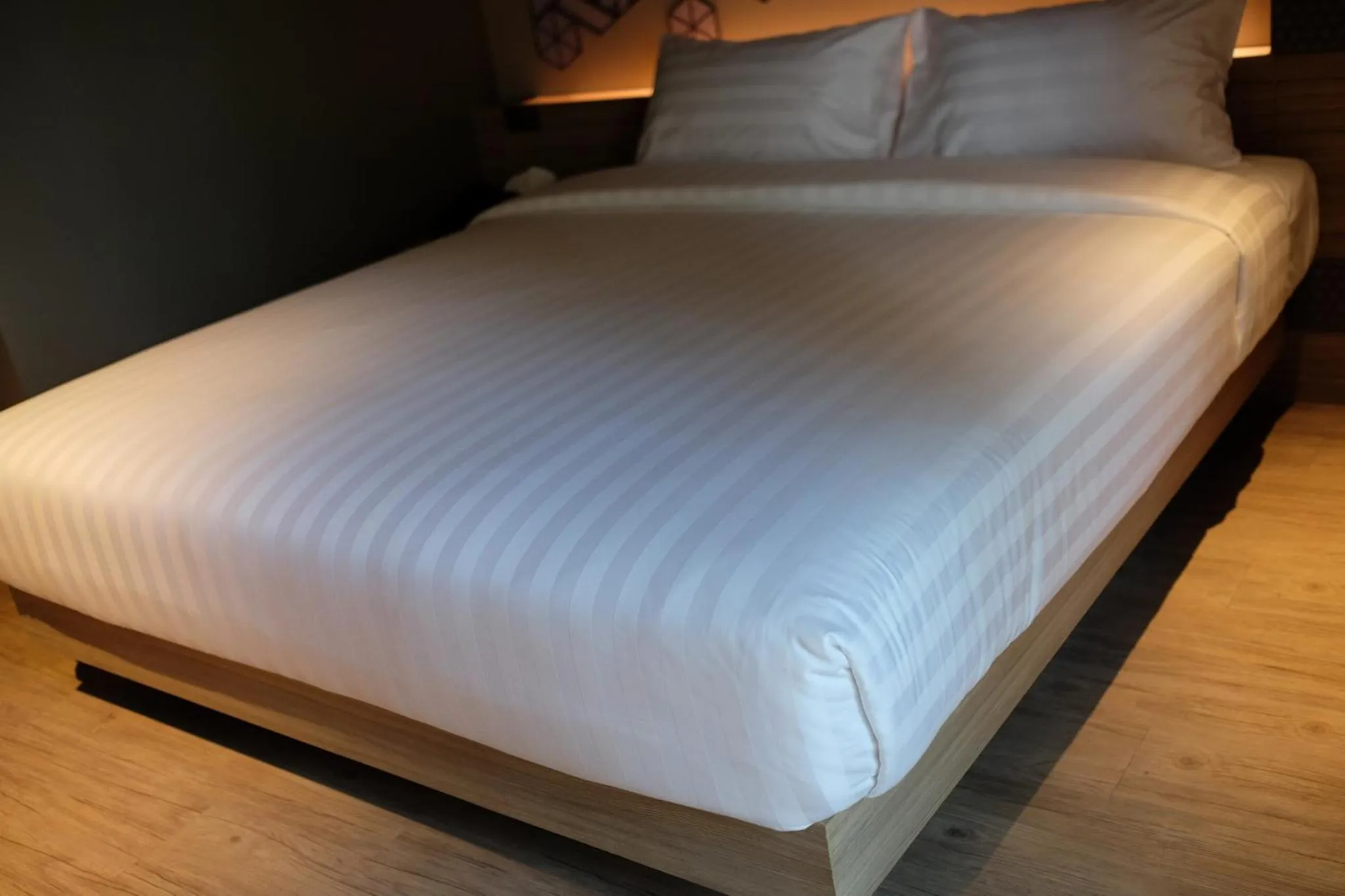 Bed in NAP Hotel Bangkok
