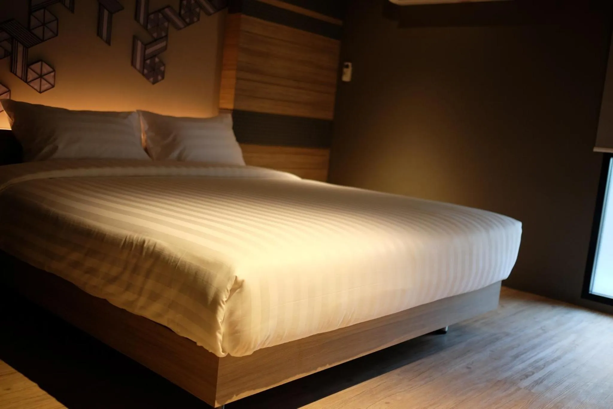 Bed in NAP Hotel Bangkok