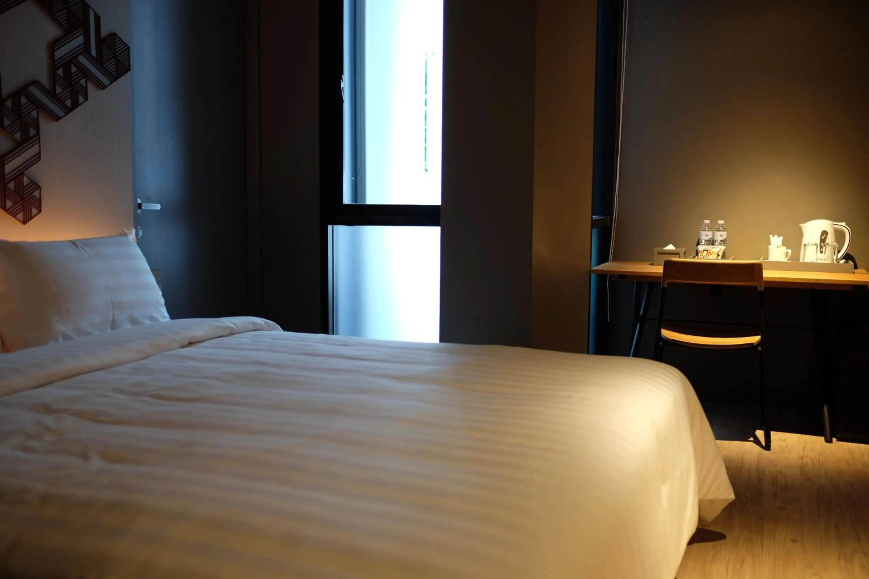 Bed in NAP Hotel Bangkok