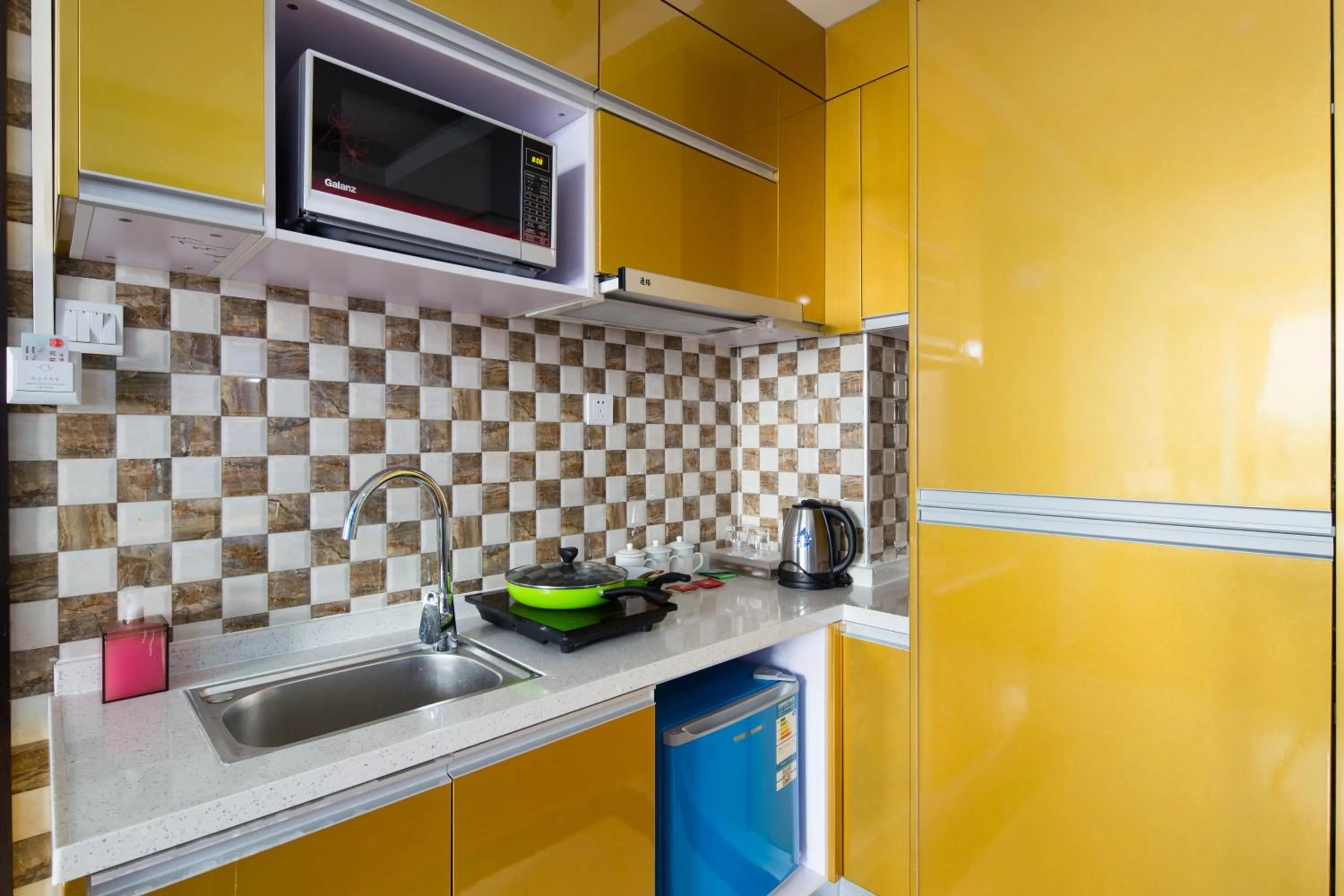Kitchen or kitchenette in Guangzhou Xingke Apartment