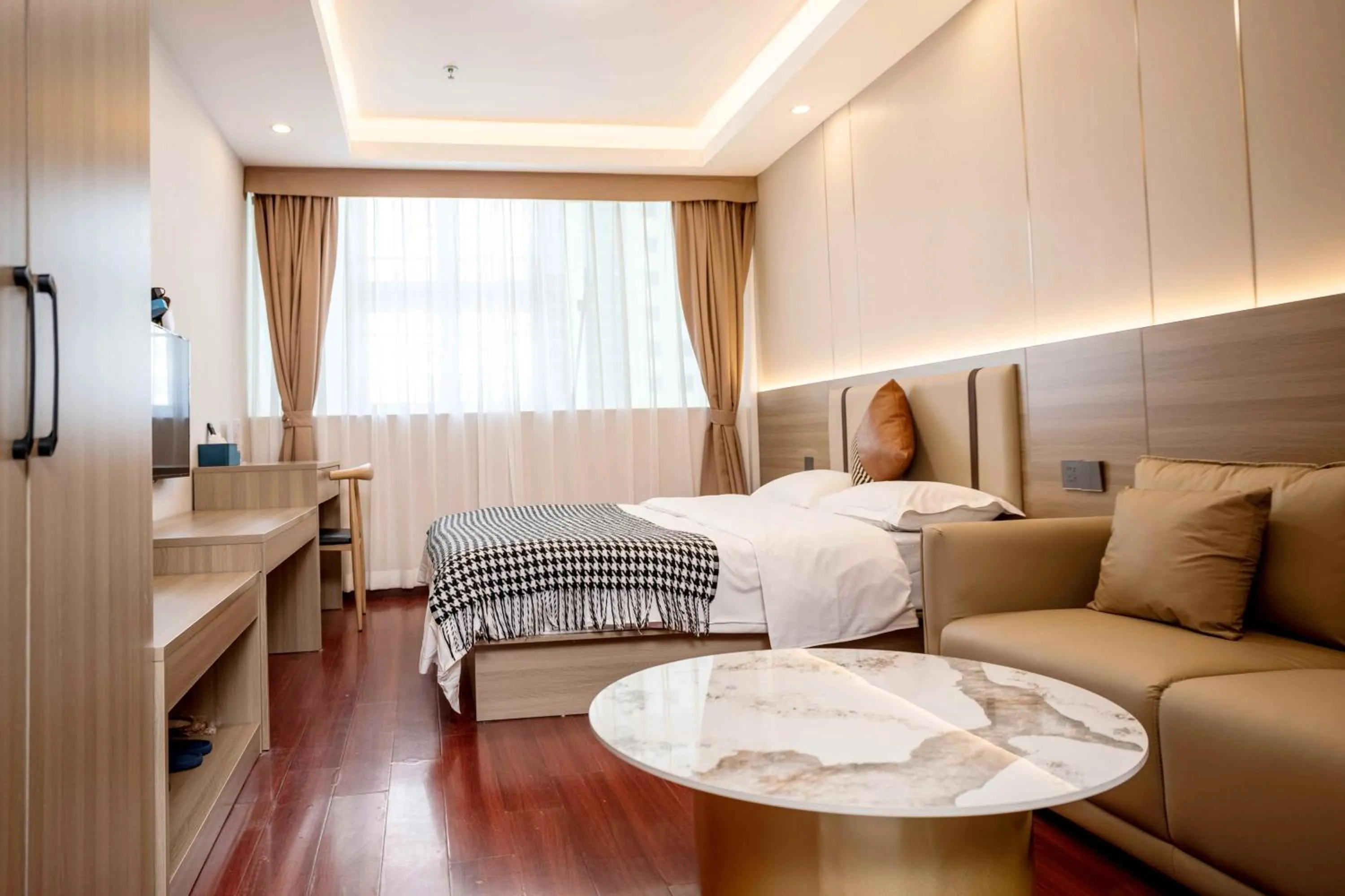 Bed in Guangzhou Xingke Apartment