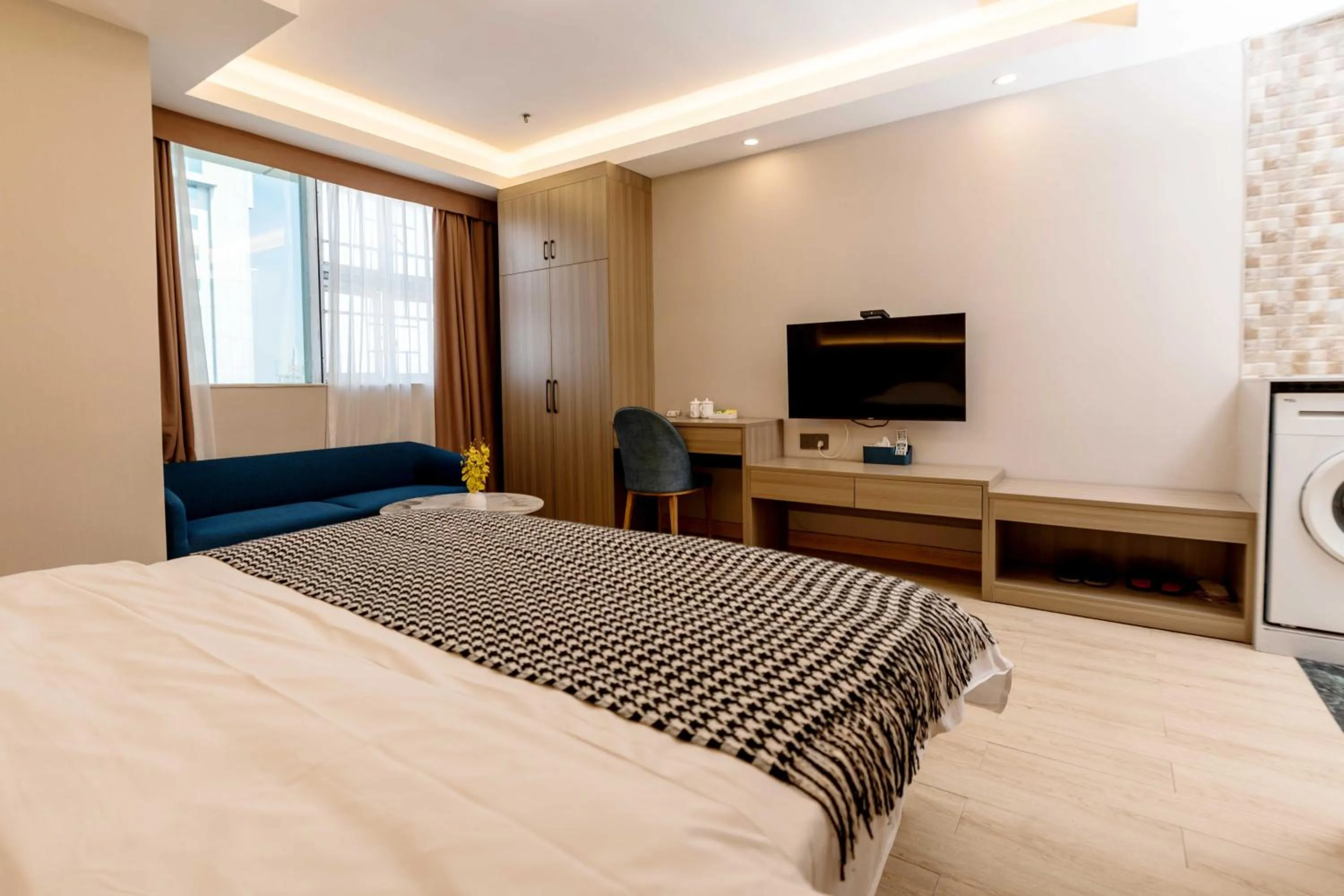 Bed in Guangzhou Xingke Apartment