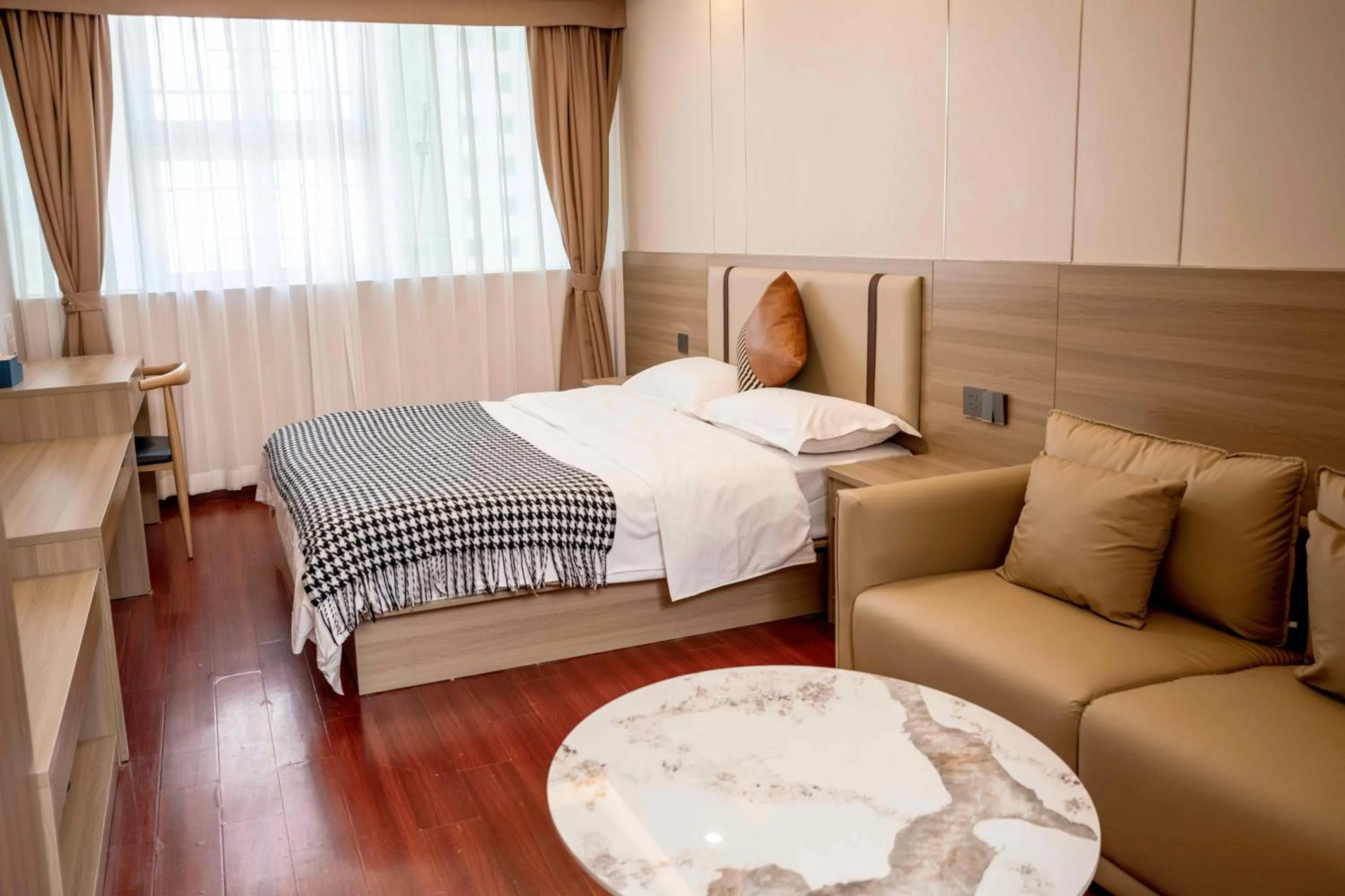 Bed in Guangzhou Xingke Apartment