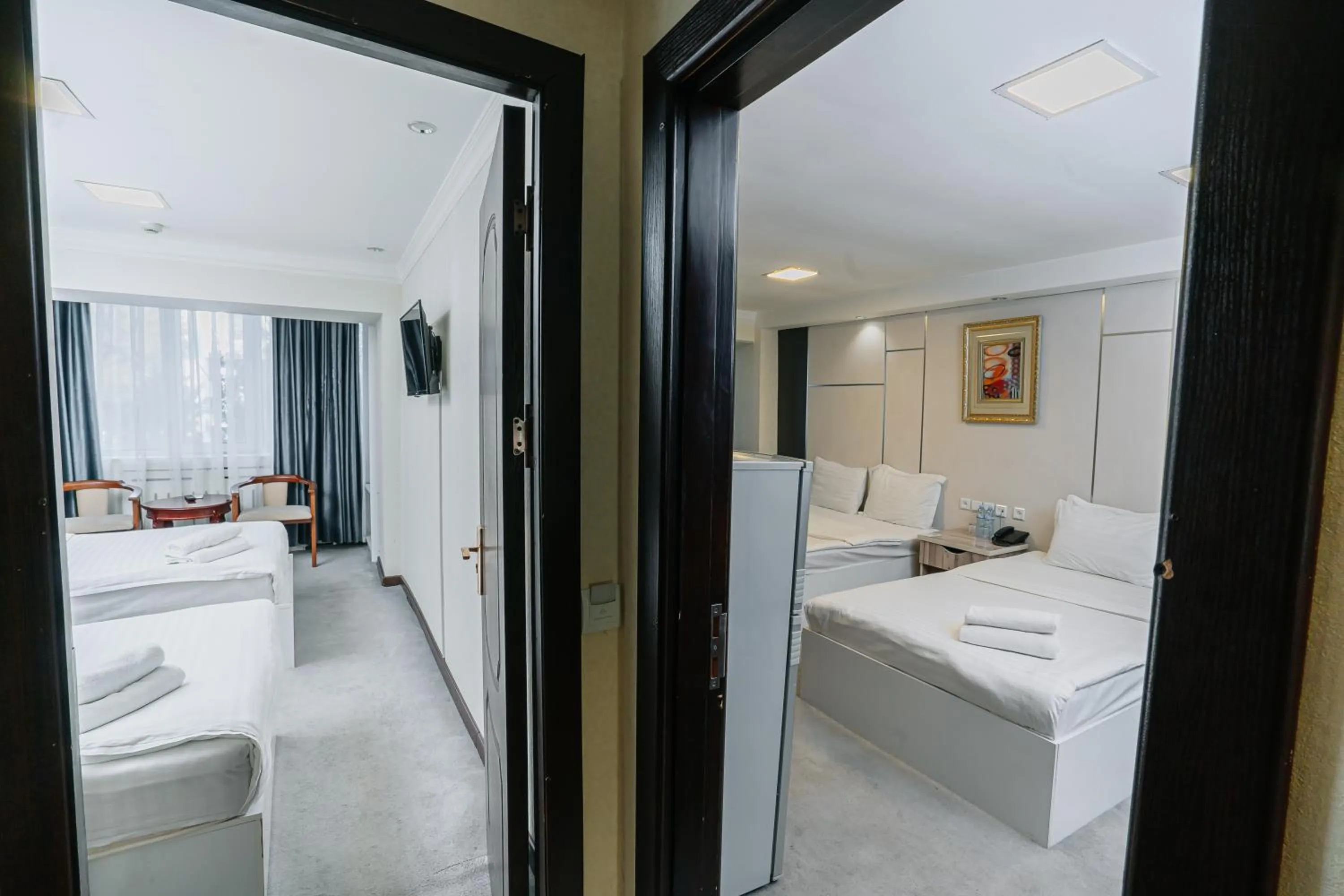 Standard Quadruple Room in Sayohat Hotel