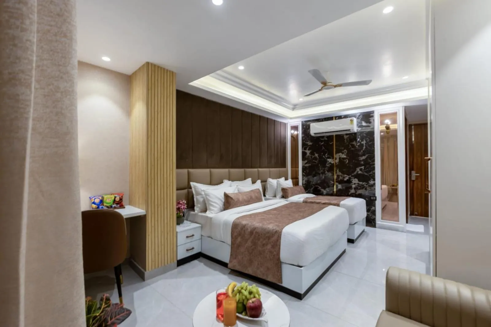 Photo of the whole room, Bed in Hotel Aroma Suites Delhi Airport