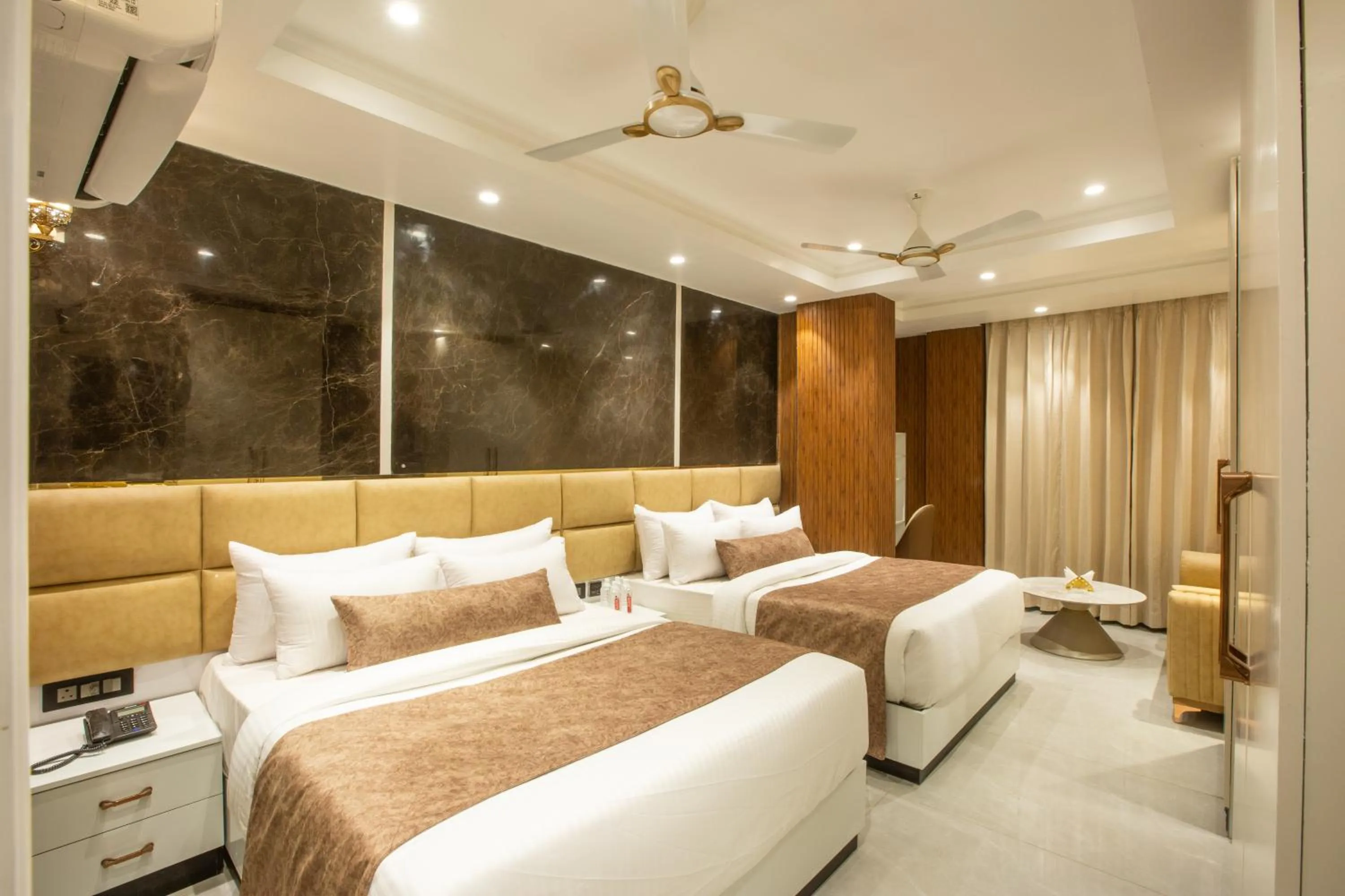 Photo of the whole room, Bed in Hotel Aroma Suites Delhi Airport