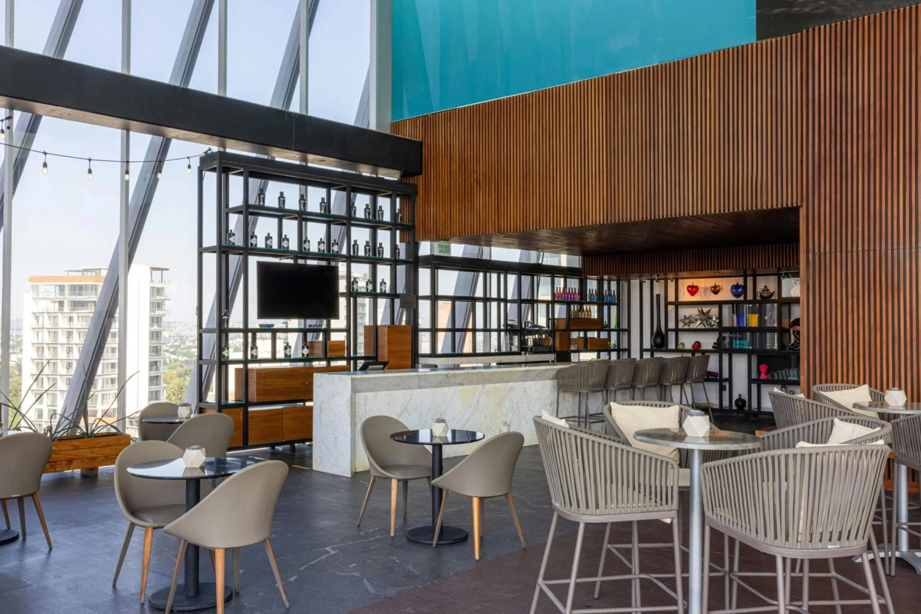 Lounge or bar in AC Hotel by Marriott Guadalajara Mexico