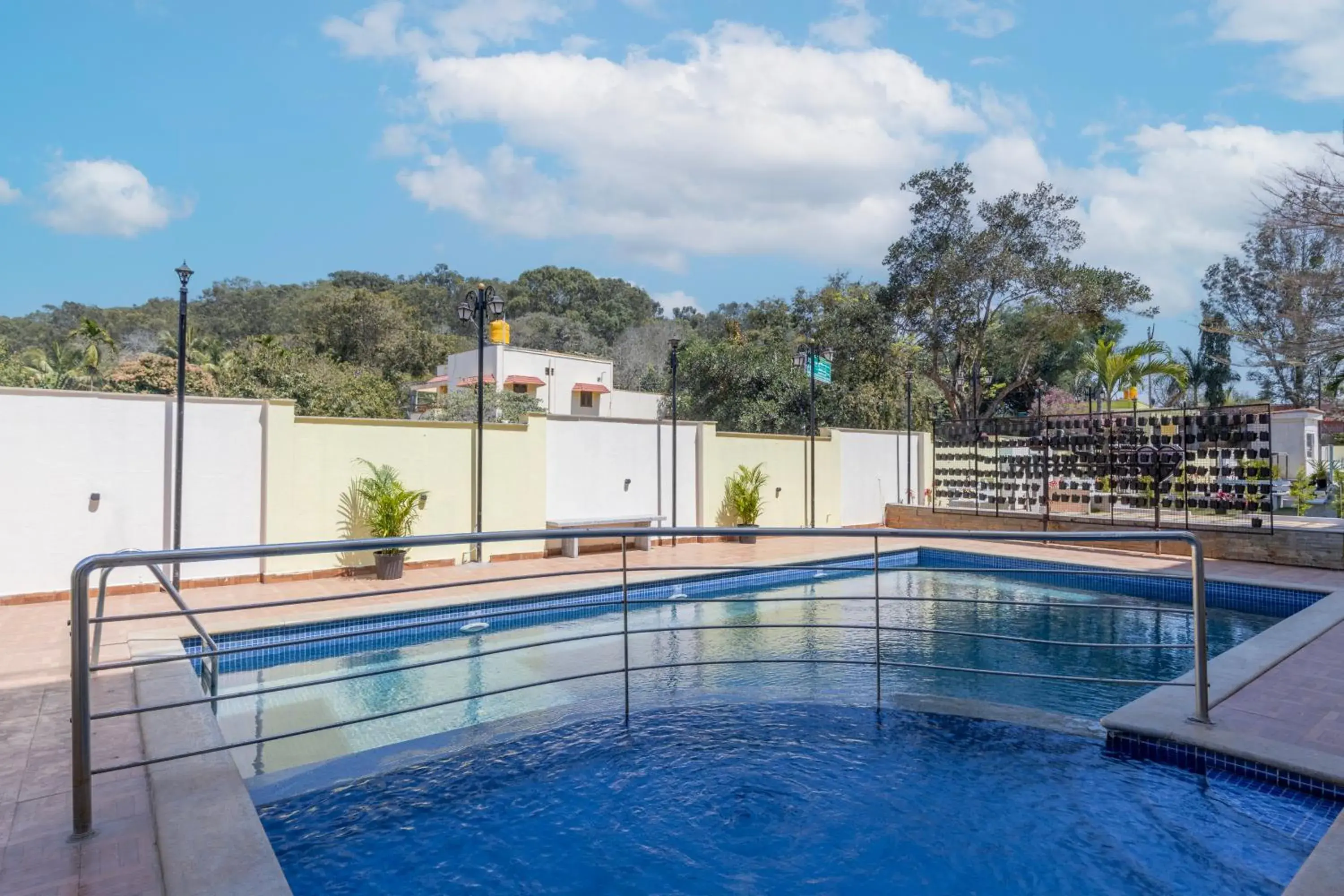 Swimming pool in Treebo Premium Emerald Dove Swimming pool in Treebo Premium Emerald Dove