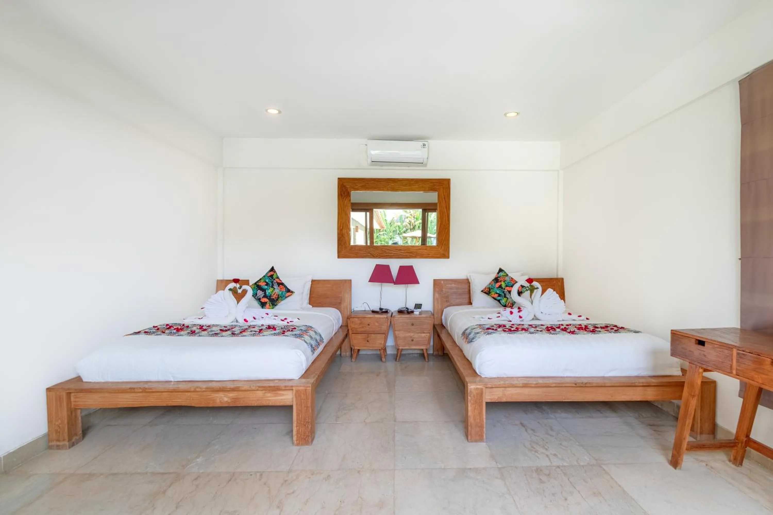 Bed in Two Lizards Beach Villas